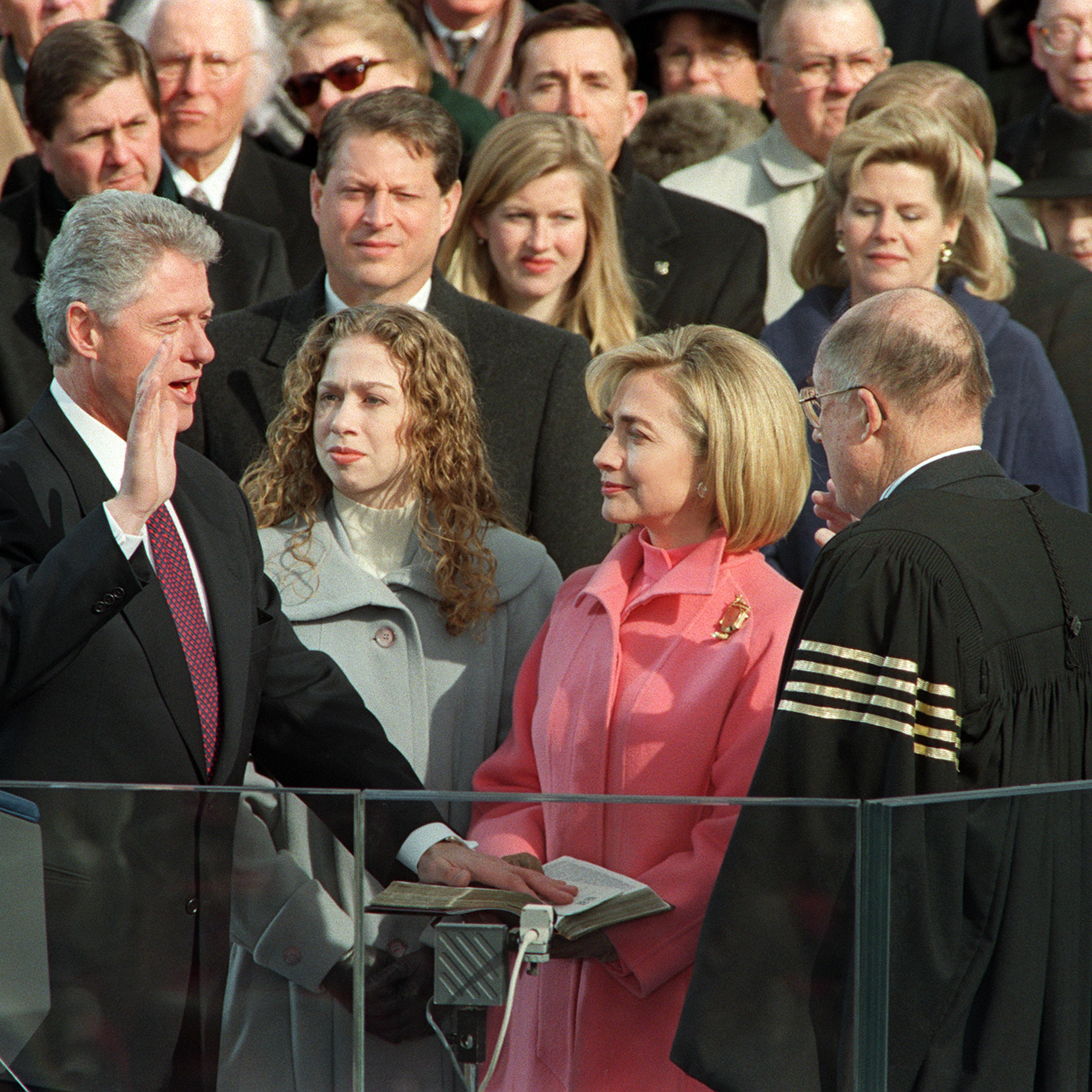 US President Bill Clinton (L) is sworn in 20 Janua