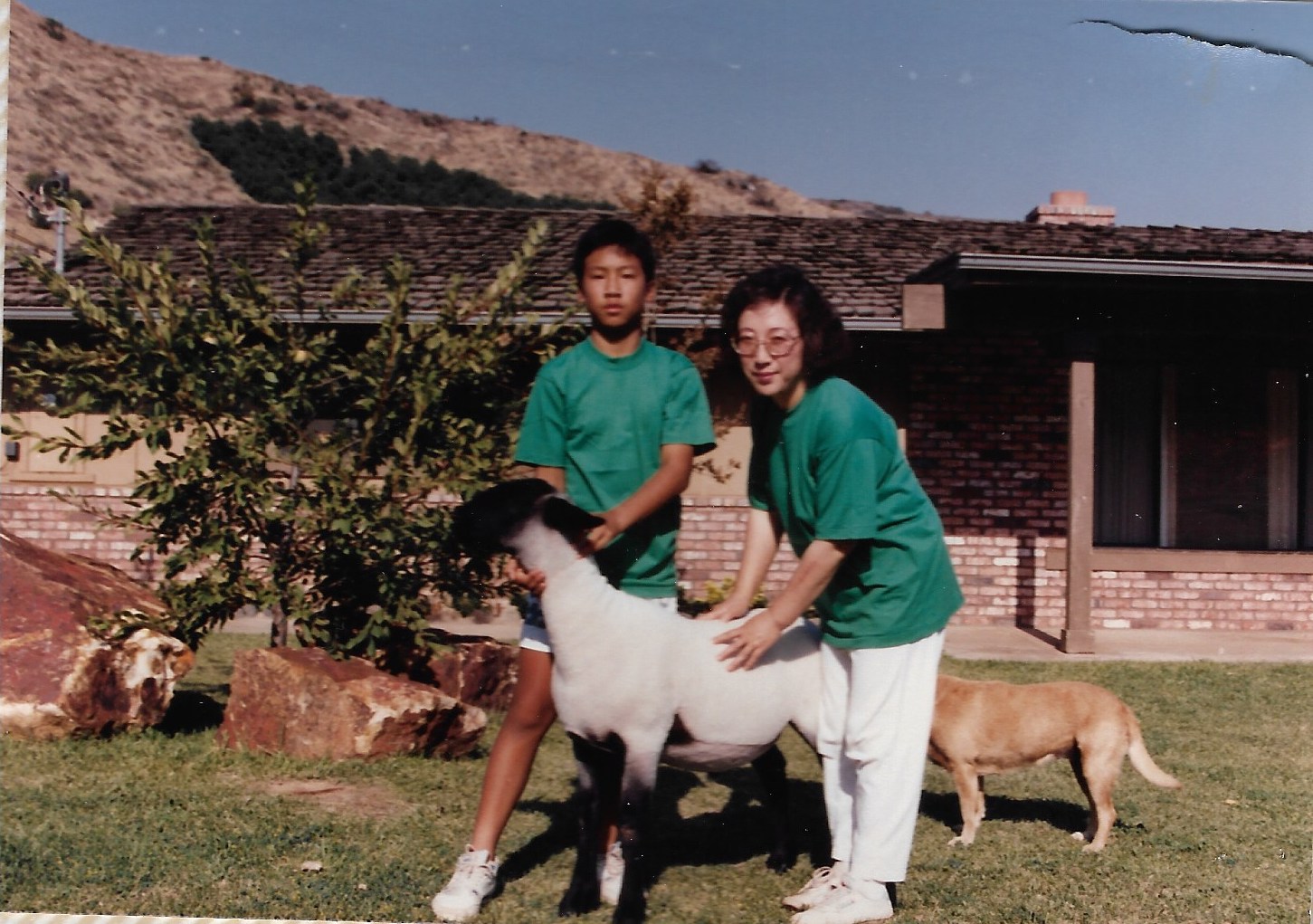 Joseph Chong, left, with his mother Sun Ok Chong on their California farm in the 1980s.