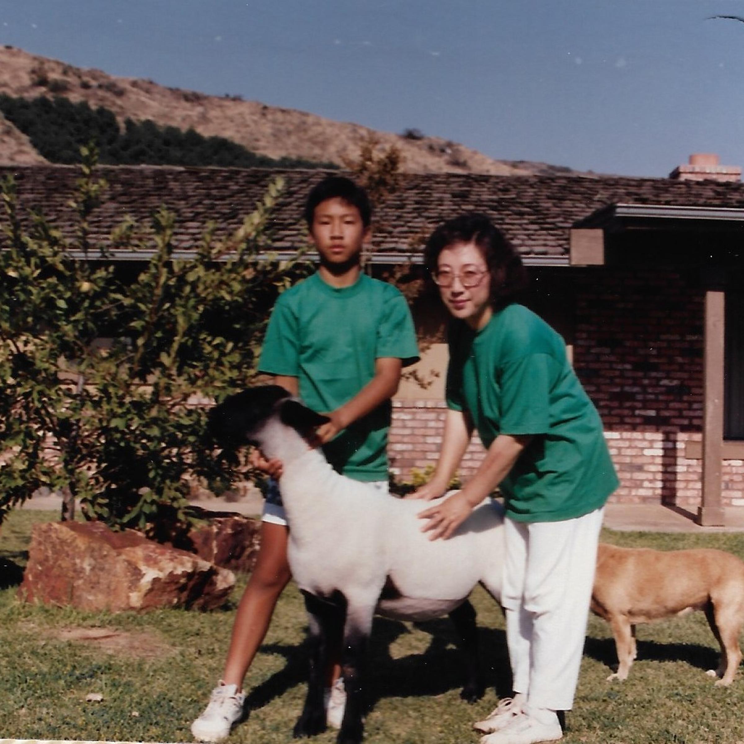 Joseph Chong, left, with his mother Sun Ok Chong on their California farm in the 1980s.