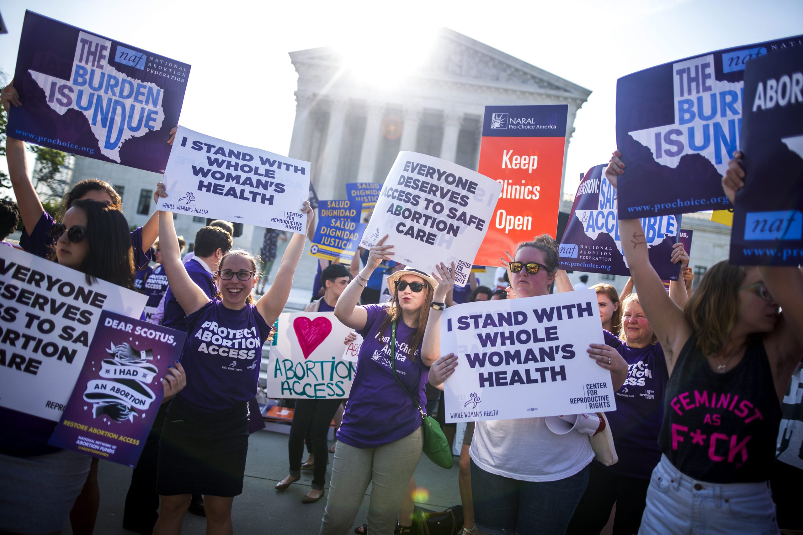 Pro-choice advocates dance outside the Supreme Court where justices are weighing a case that imposes heavy restrictions on abortion clinics in Texas, Washington, D.C. on June 26, 2016.