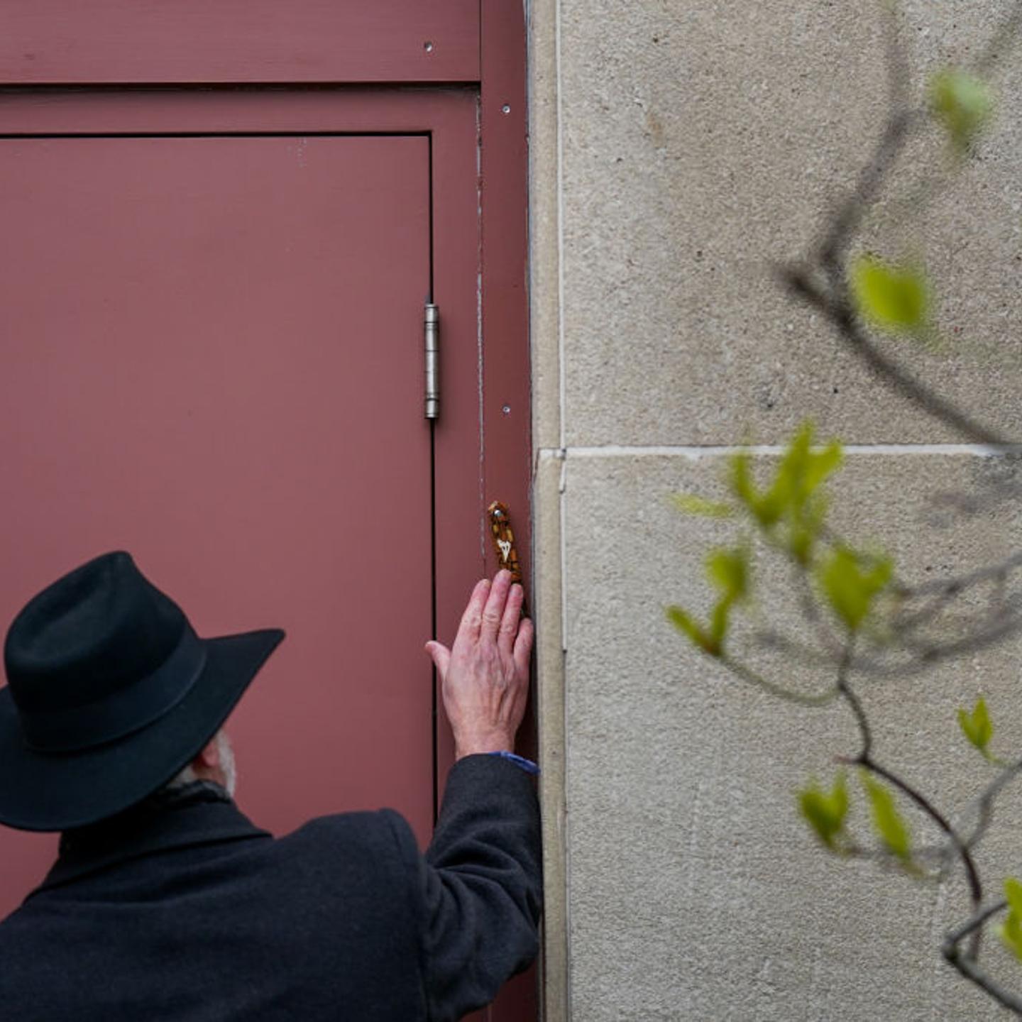 PITTSBURGH, PA - APRIL 23:
Rabbi Jeffrey Myers touches the bui