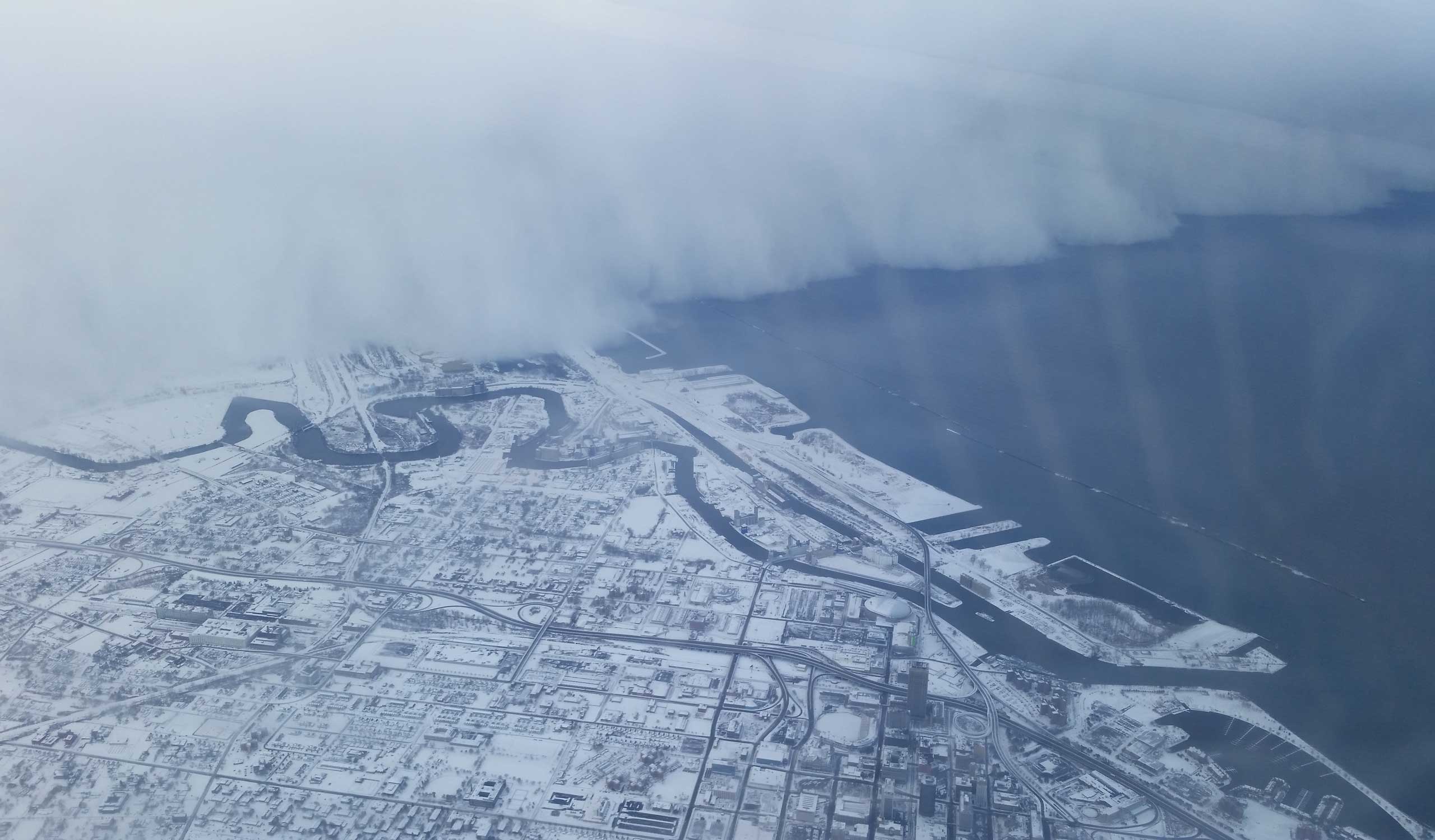 Nov. 18, 2014. This picture was taken by Jeffrey Suhr on his way from Buffalo, N.Y. to Minneapolis and was posted on his Twitter.   
"I live 3 miles from the airport, and I was surprised how much snow was at my house and how little was at the airport. So when I saw the well-defined snow band after take off, I thought I would take a photo," Suhr tells TIME.  
