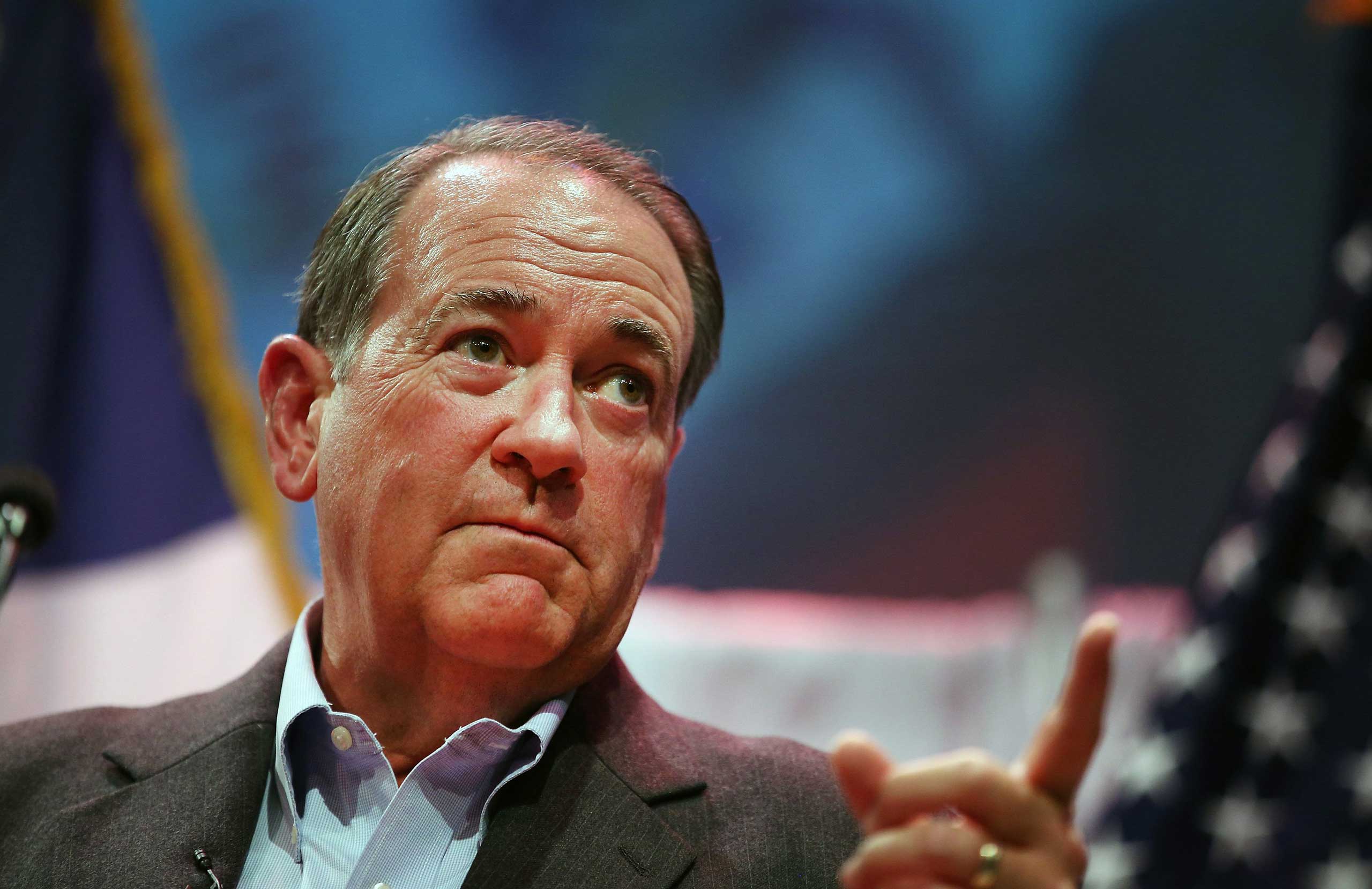 Former Arkansas Governor Mike Huckabee speaks to guests gathered at the Point of Grace Church for the Iowa Faith and Freedom Coalition 2015 Spring Kickoff in Waukee, Iowa on April 25, 2015.