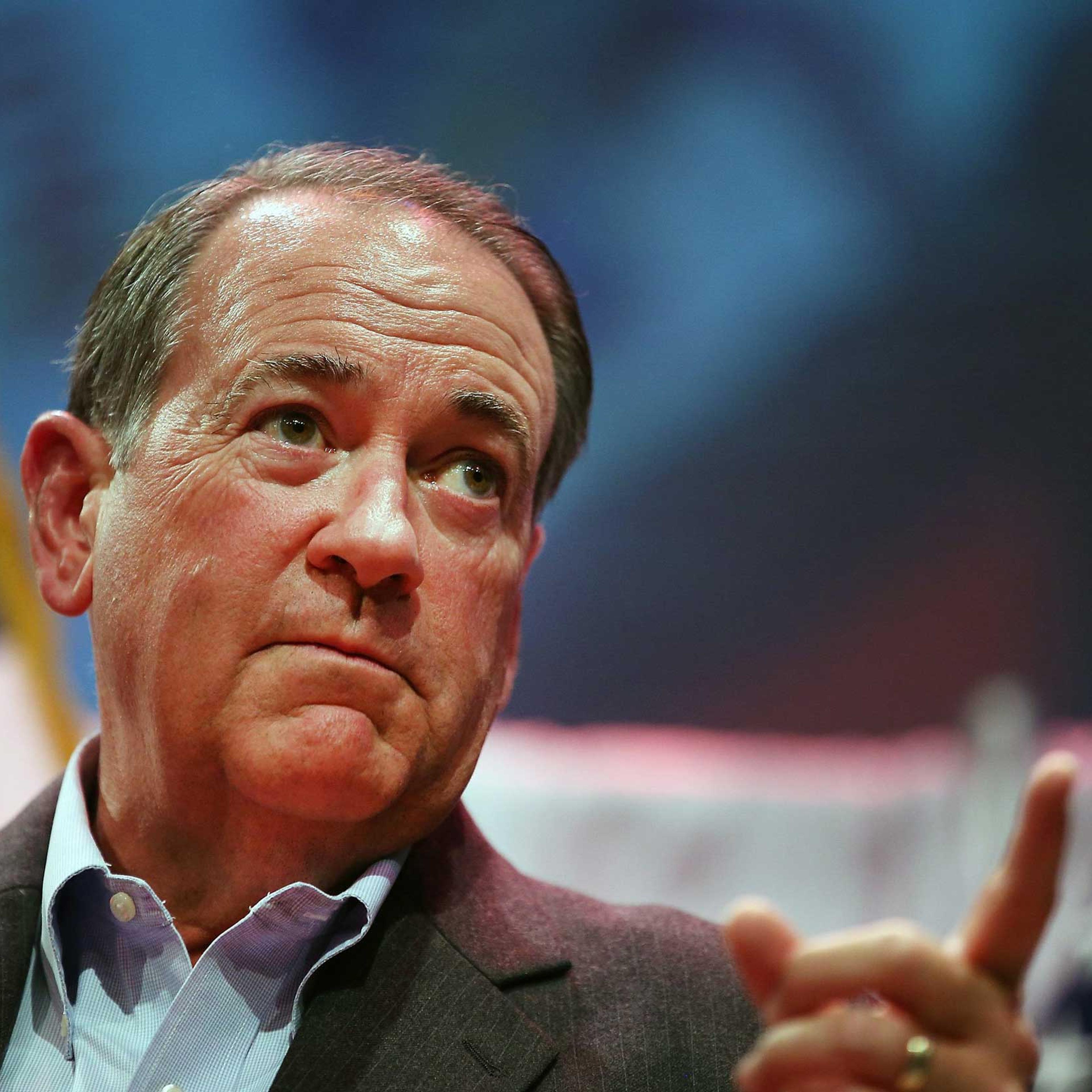Former Arkansas Governor Mike Huckabee speaks to guests gathered at the Point of Grace Church for the Iowa Faith and Freedom Coalition 2015 Spring Kickoff in Waukee, Iowa on April 25, 2015.