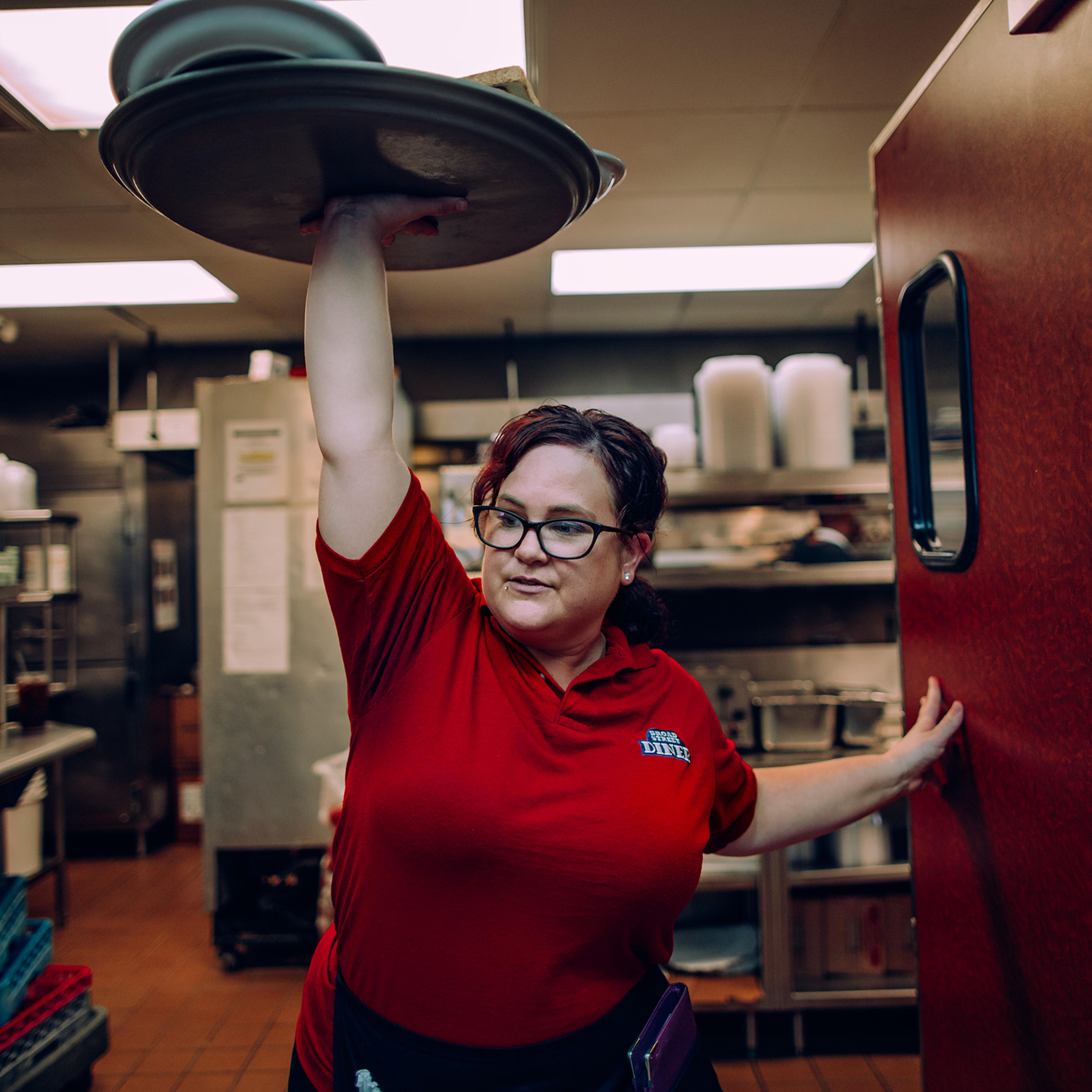 Christina Munce waits tables at Broad Street Diner in Philadelphia, where she’s worked for more than eight years.