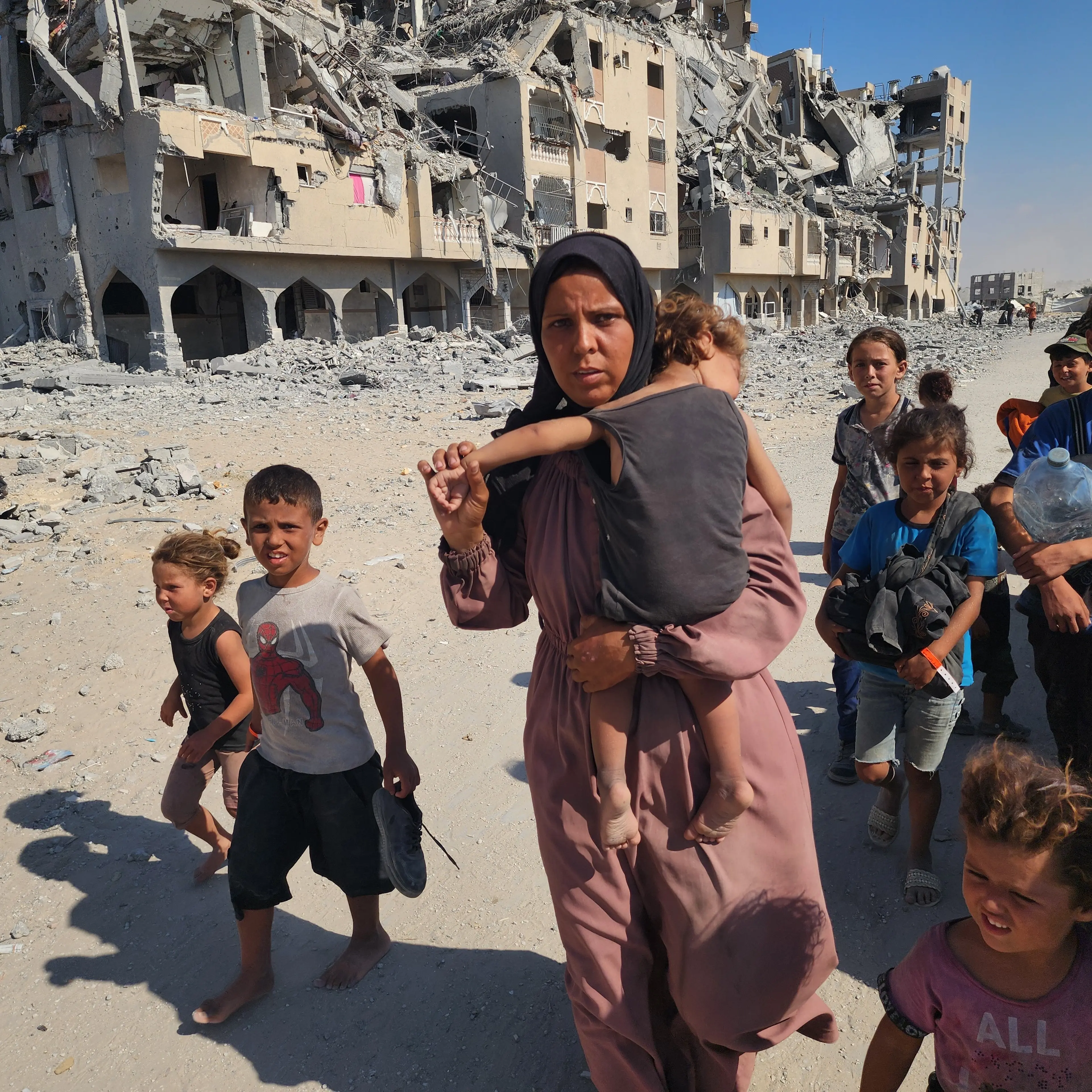 Palestinian families fleeing Gaza search for shelter in Khan Yunis