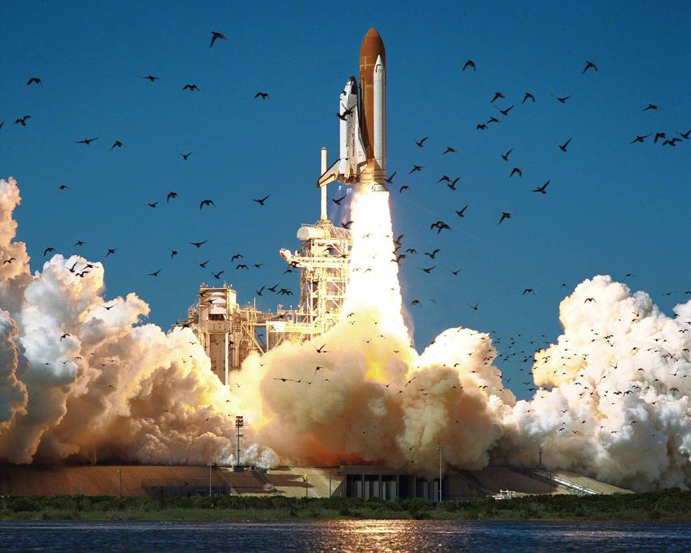 The Space Shuttle Challenger clears the launch pad on January 28, 1986. Seventy-three seconds after launch, it exploded, killing all seven crew members.