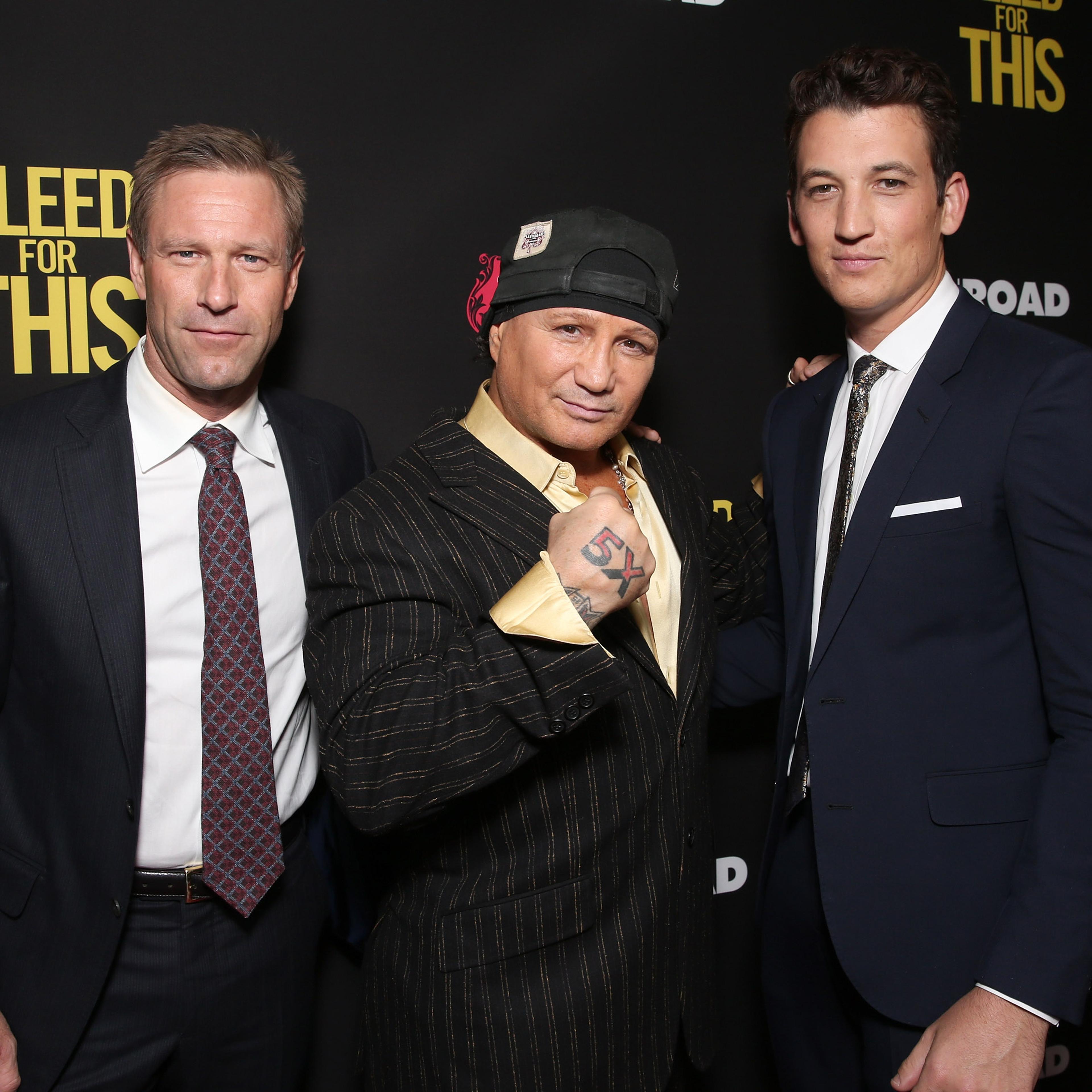 Aaron Eckhart, Vinny Paz and Miles Teller attend the Premiere of "Bleed For This" on November 2, 2016 in Beverly Hills, California.