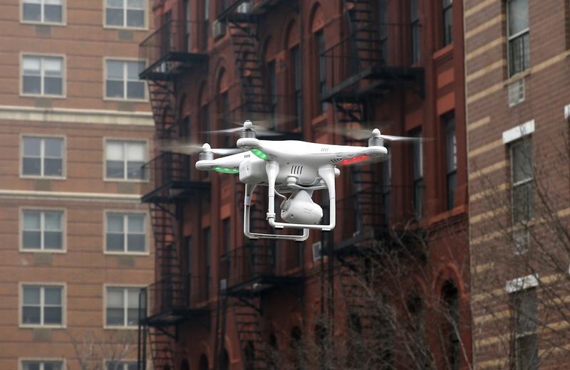 A camera drone flies in New York City, March 12, 2014