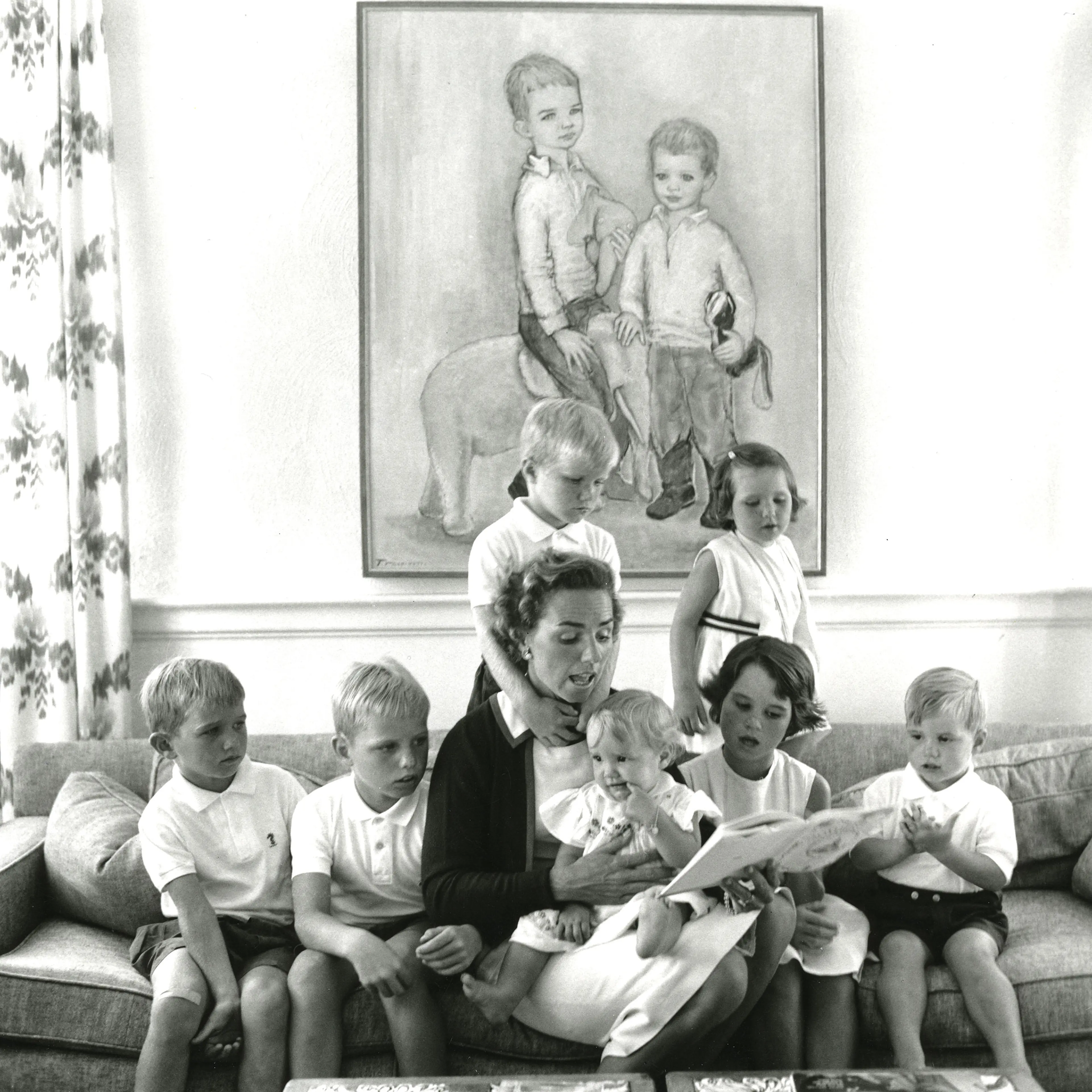 Ethel Skakel Kennedy reads to a her children as they all sit on a sofa, McLean, Virginia, early 1960s. Ethel Skakel Kennedy reads to a her children as they all sit on a sofa, McLean, Virginia, early 1960s. Ethel Skakel Kennedy reads to a her children as