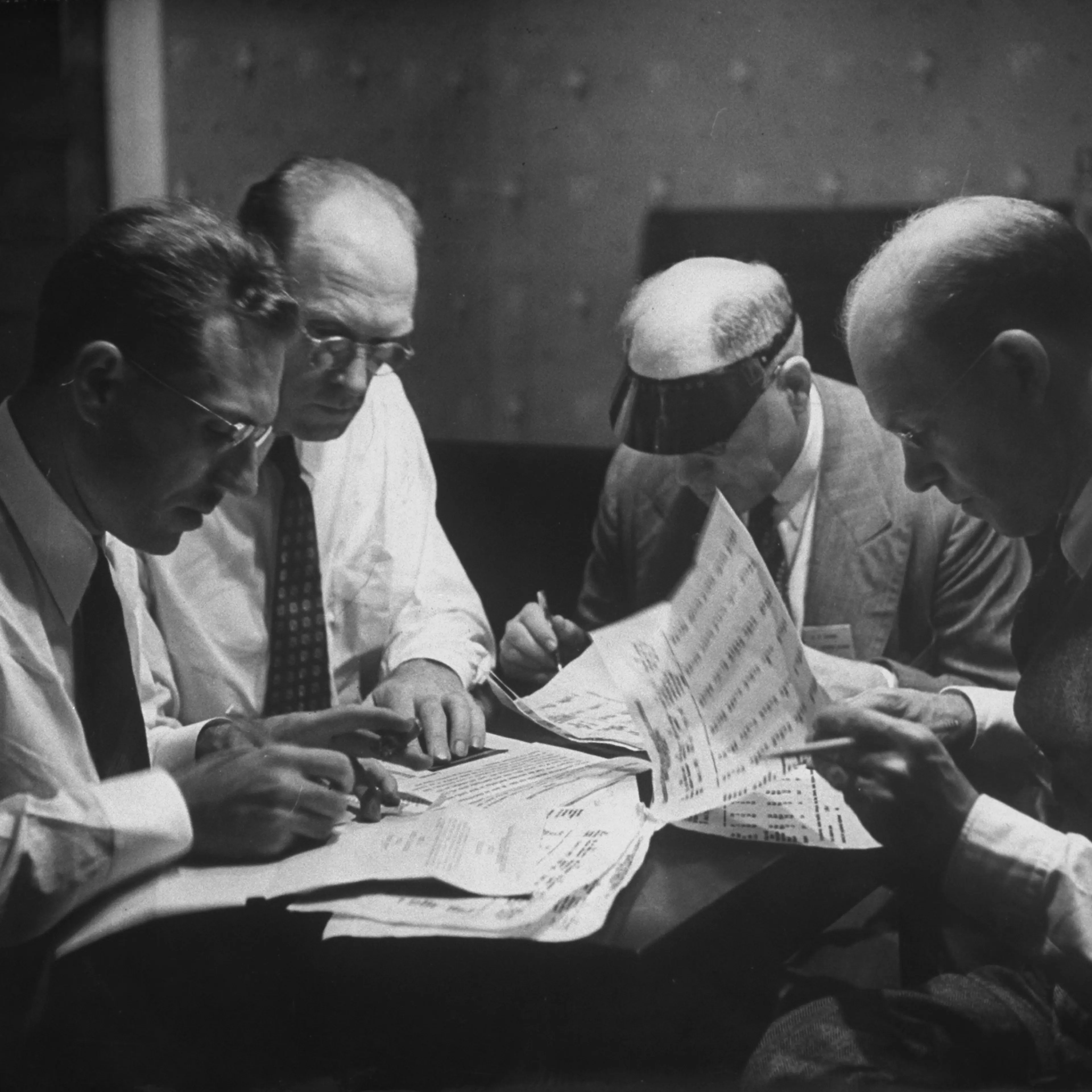 American delegation subcommittee working at night on