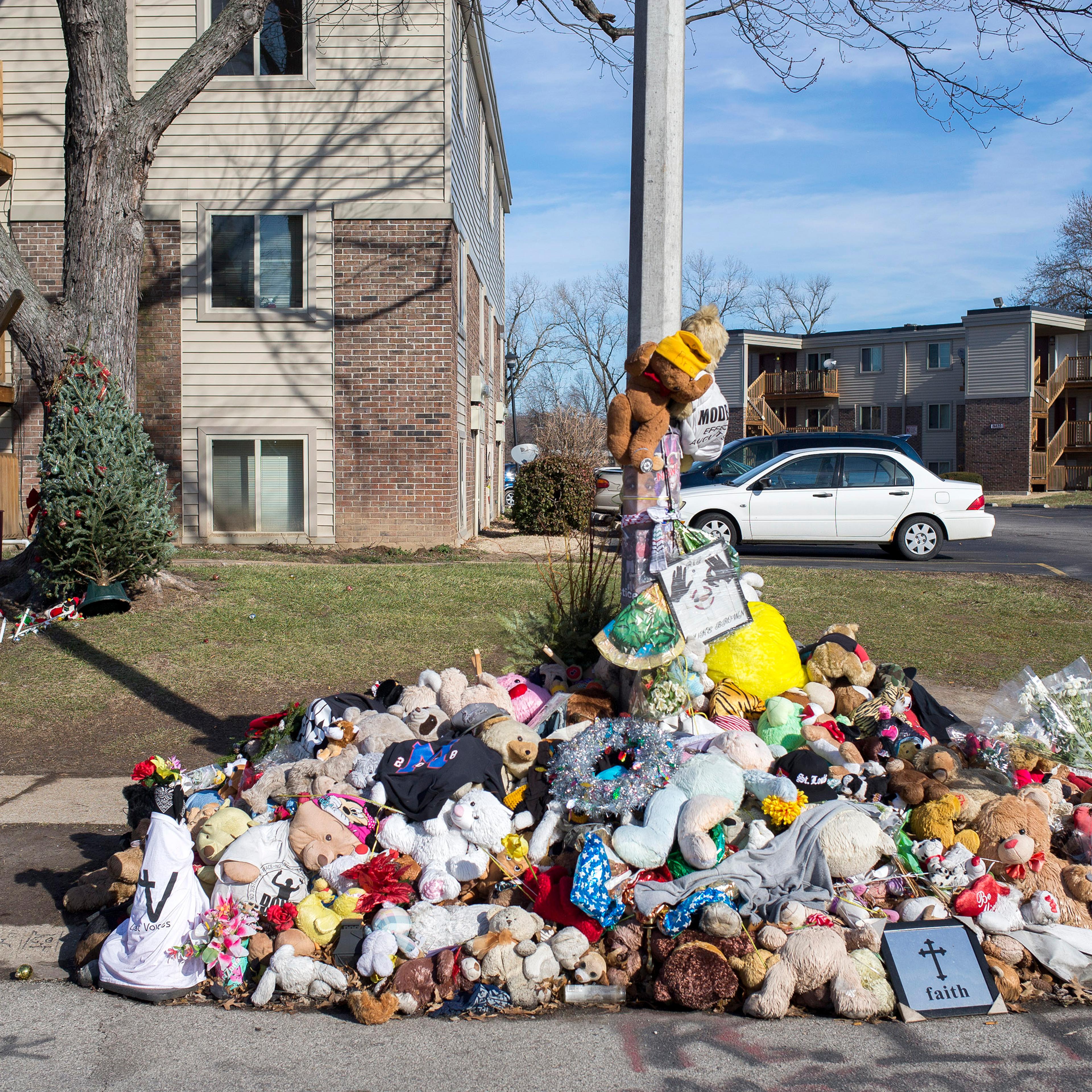 A Christmas tree is seen near a memorial to Michael Brown in Ferguson