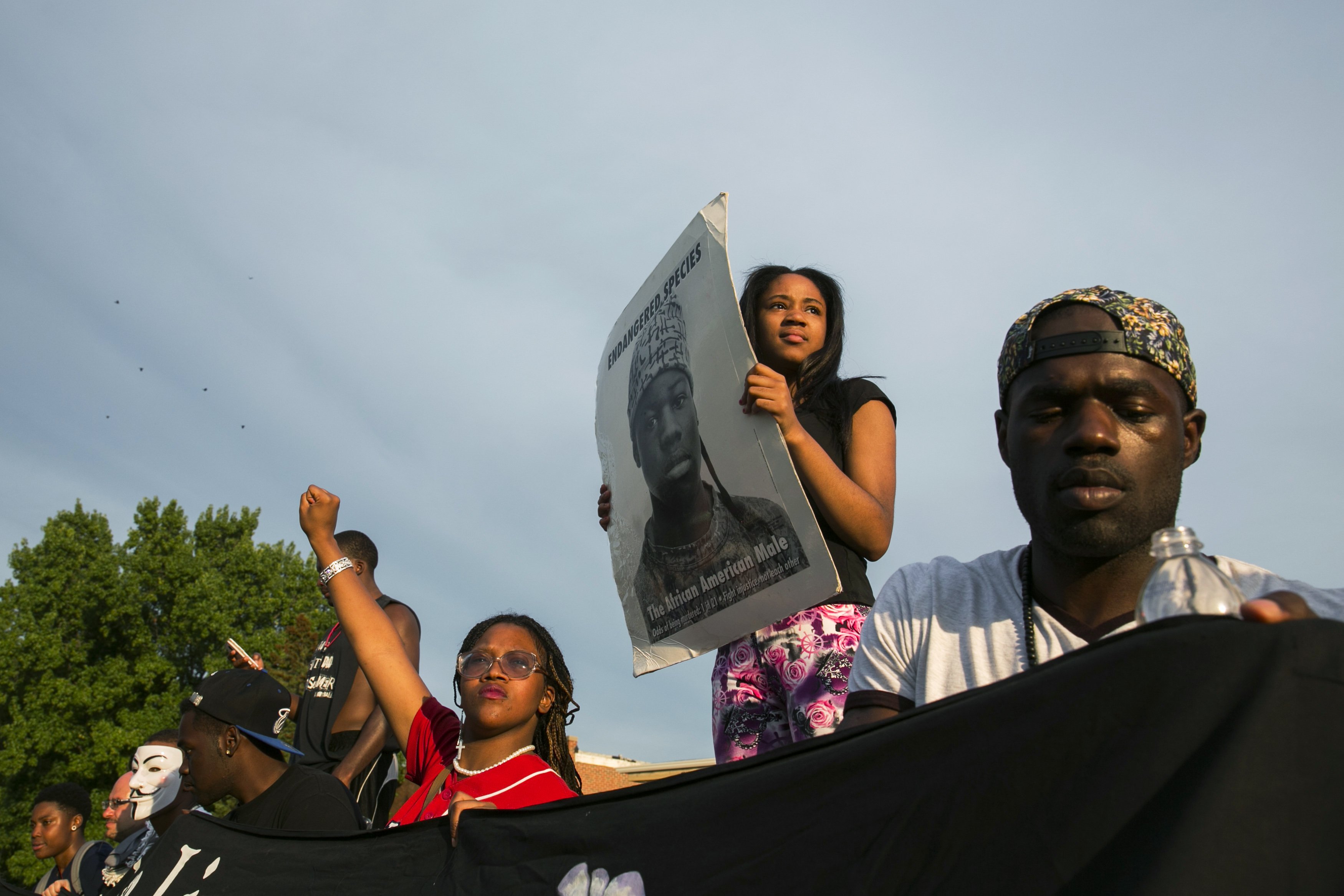 Demonstrators protest outside of Greater St. Marks Family Church in Ferguson, Missouri
