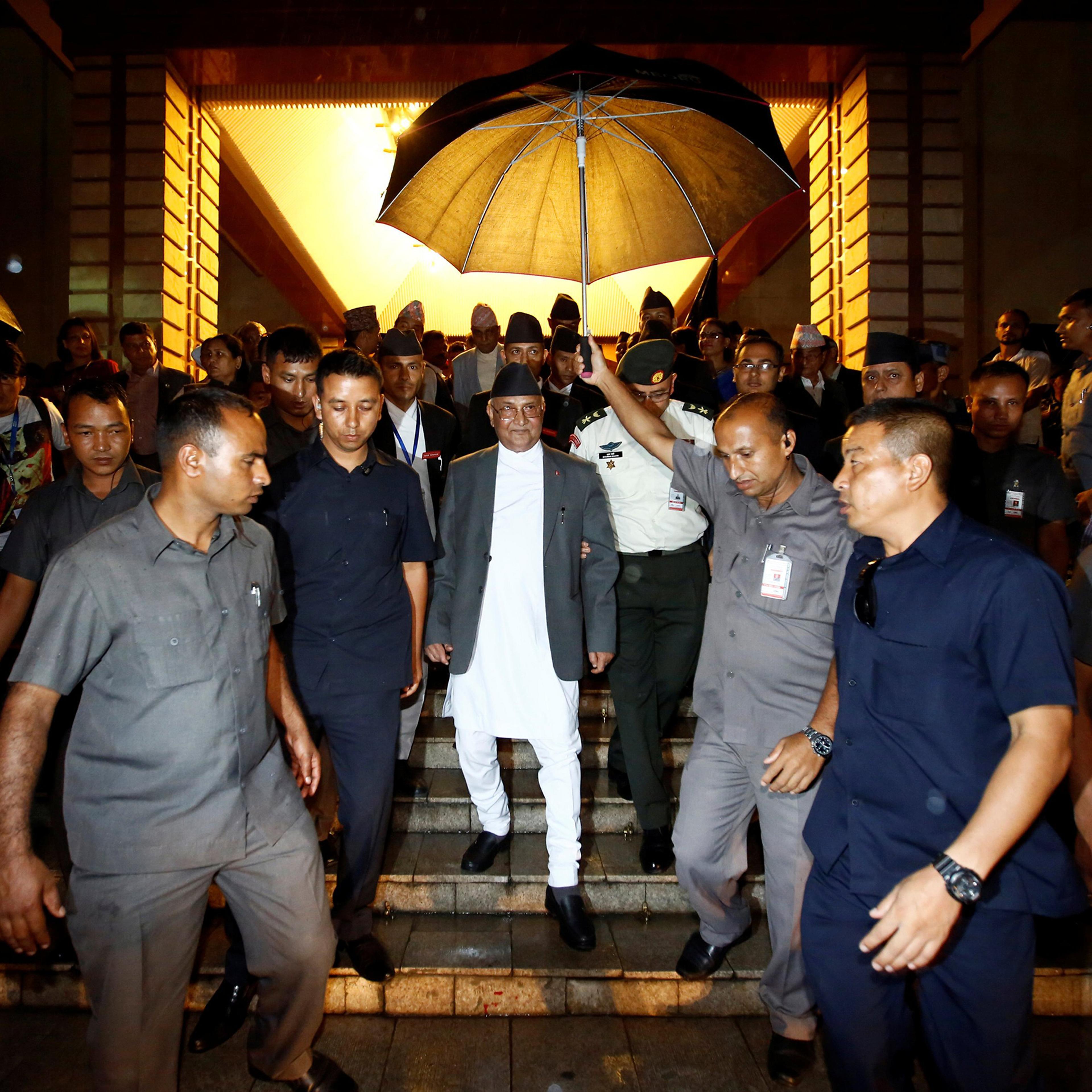 Nepal's Prime Minister Khadga Prasad Sharma Oli, also known as KP Oli, walks out from the parliament after announcing his resignation in Kathmandu, Nepal, July 24, 2016.