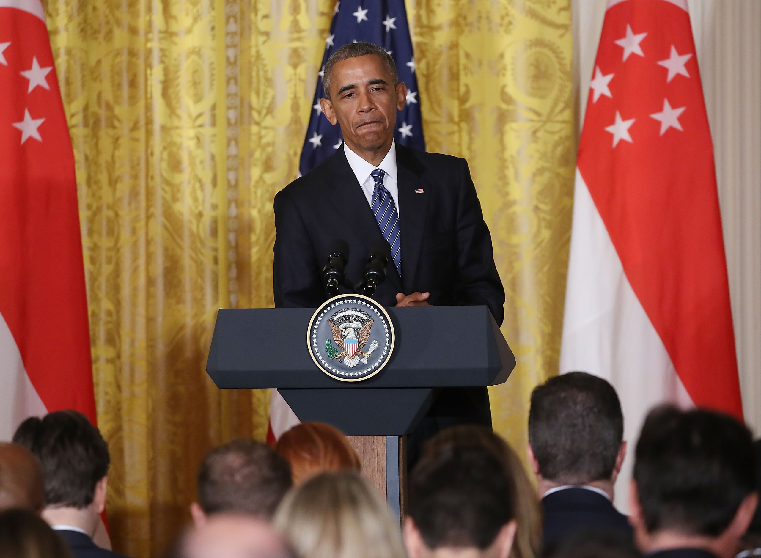 President Barack Obama, speaks about Republican Presidential candidate Donald Trump during a news conference with Singapore's Prime Minister Lee Hsien Loong, in the East Room at the White House in Washington on Aug. 2, 2016.