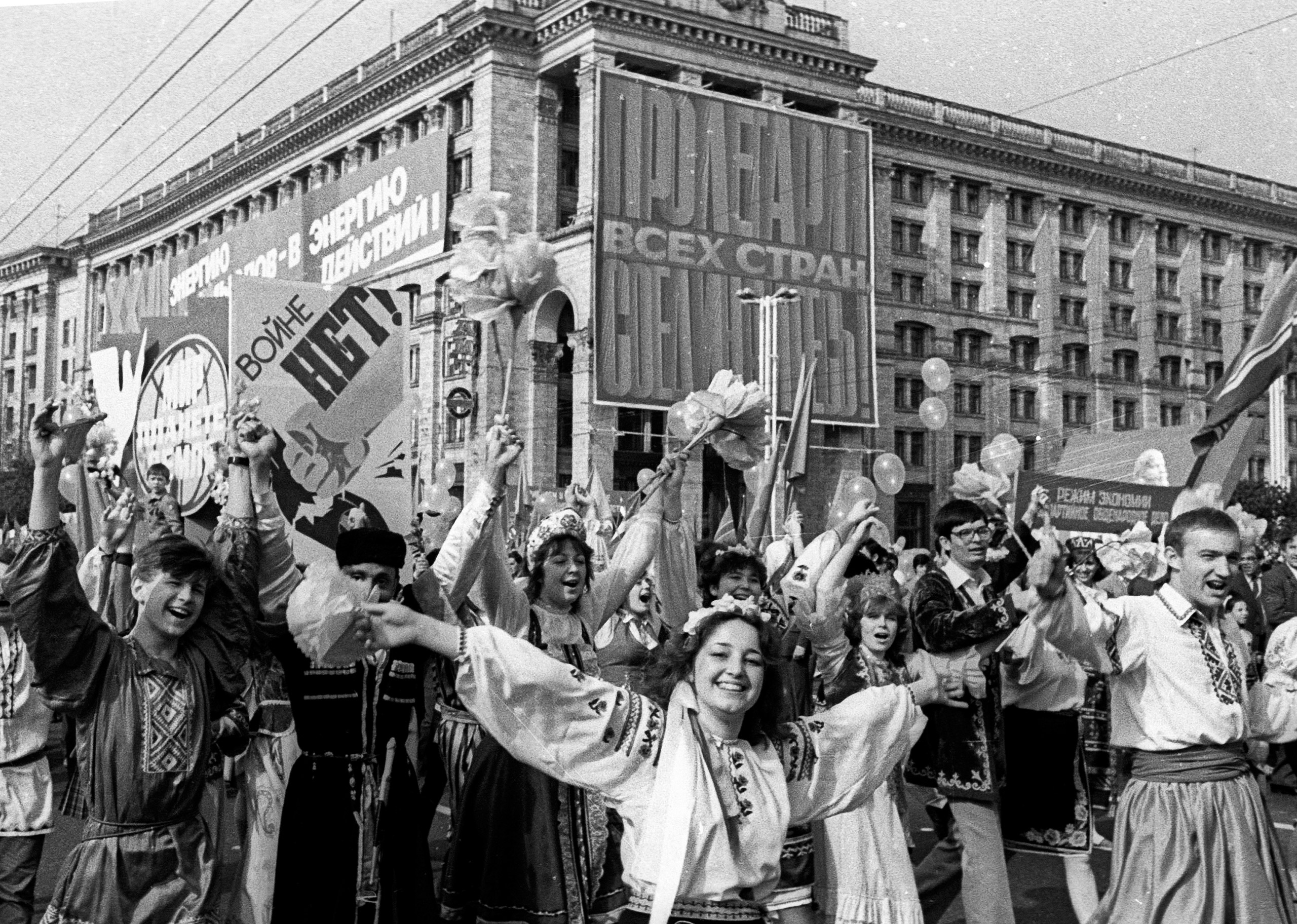 FILE - In this photo taken May 1, 1986 in Ukraine's capital Kiev, people rally to celebrate the May Day a few days after the deadly explosion on the 4th unit in Chernobyl nuclear power plant. Nobody cancelled a May Day parade in Kiev when thousands of pe