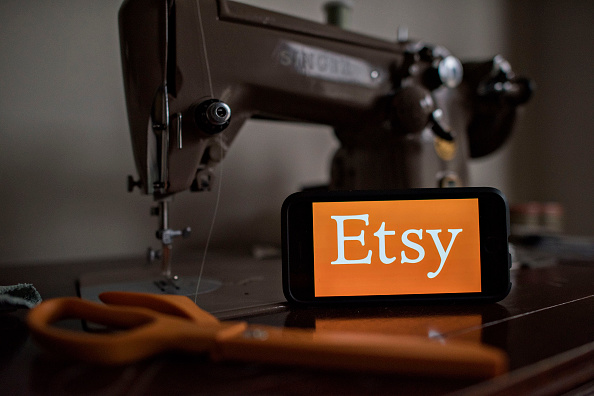 The logo of Etsy Inc., is displayed for a photograph in Tiskilwa, Illinois, U.S., on Tuesday, Jan. 20, 2015. Etsy Inc., where people sell handmade crafts and vintage goods, may be the biggest technology IPO to come out of New York since 1999. Etsy is wor
