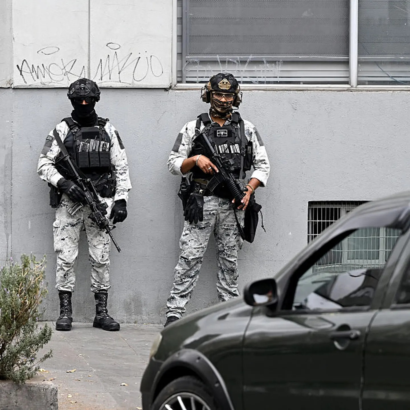 Mexican National Guard special forces stand guard outside the Specialized Prosecutor's Office for Organized Crime (FEMDO) headquarters in Mexico City on Feb. 22, 2026.