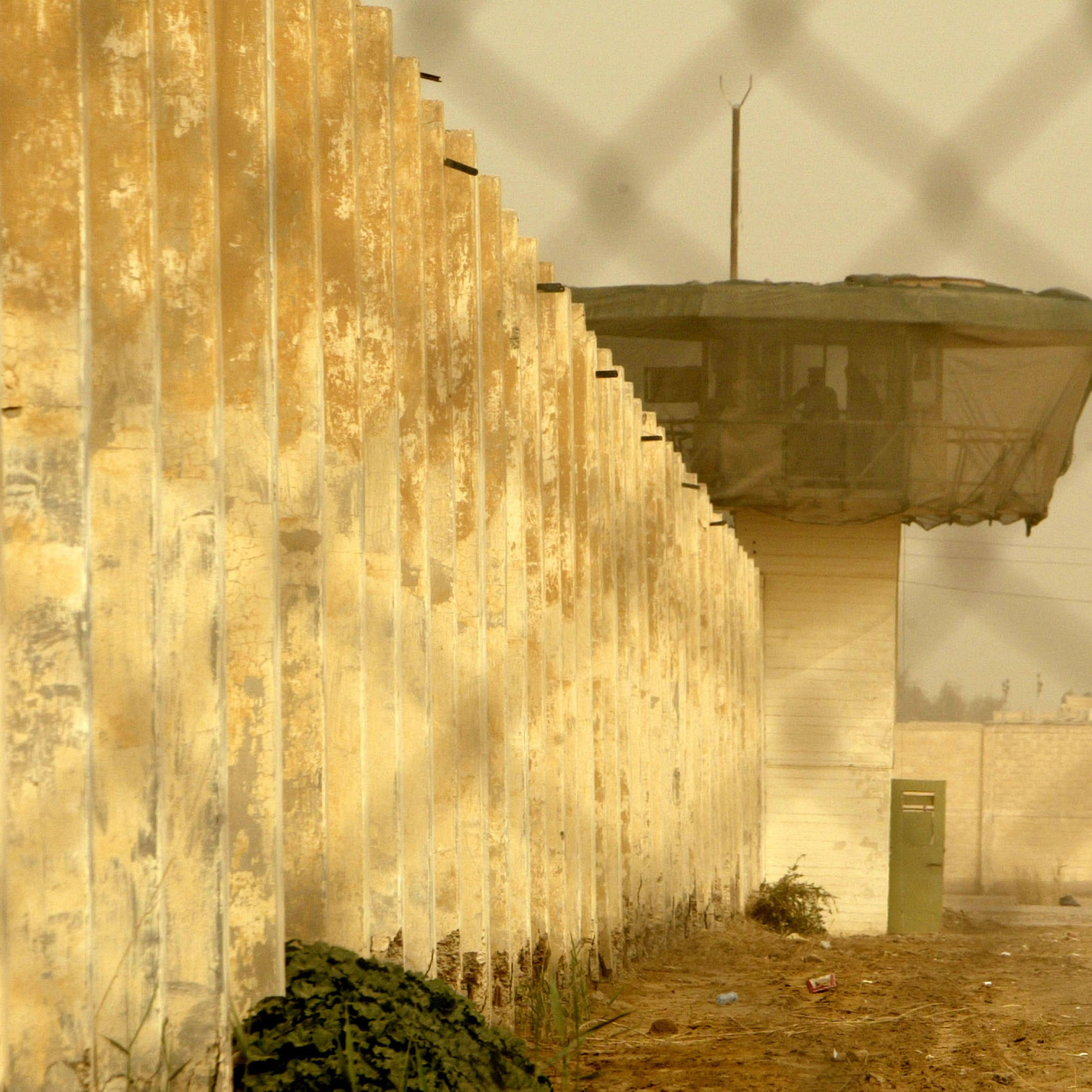 An Iraqi security officer patrols the grounds at the newly opened Baghdad Central Prison in Abu Ghraib on February 21, 2009 in Baghdad.