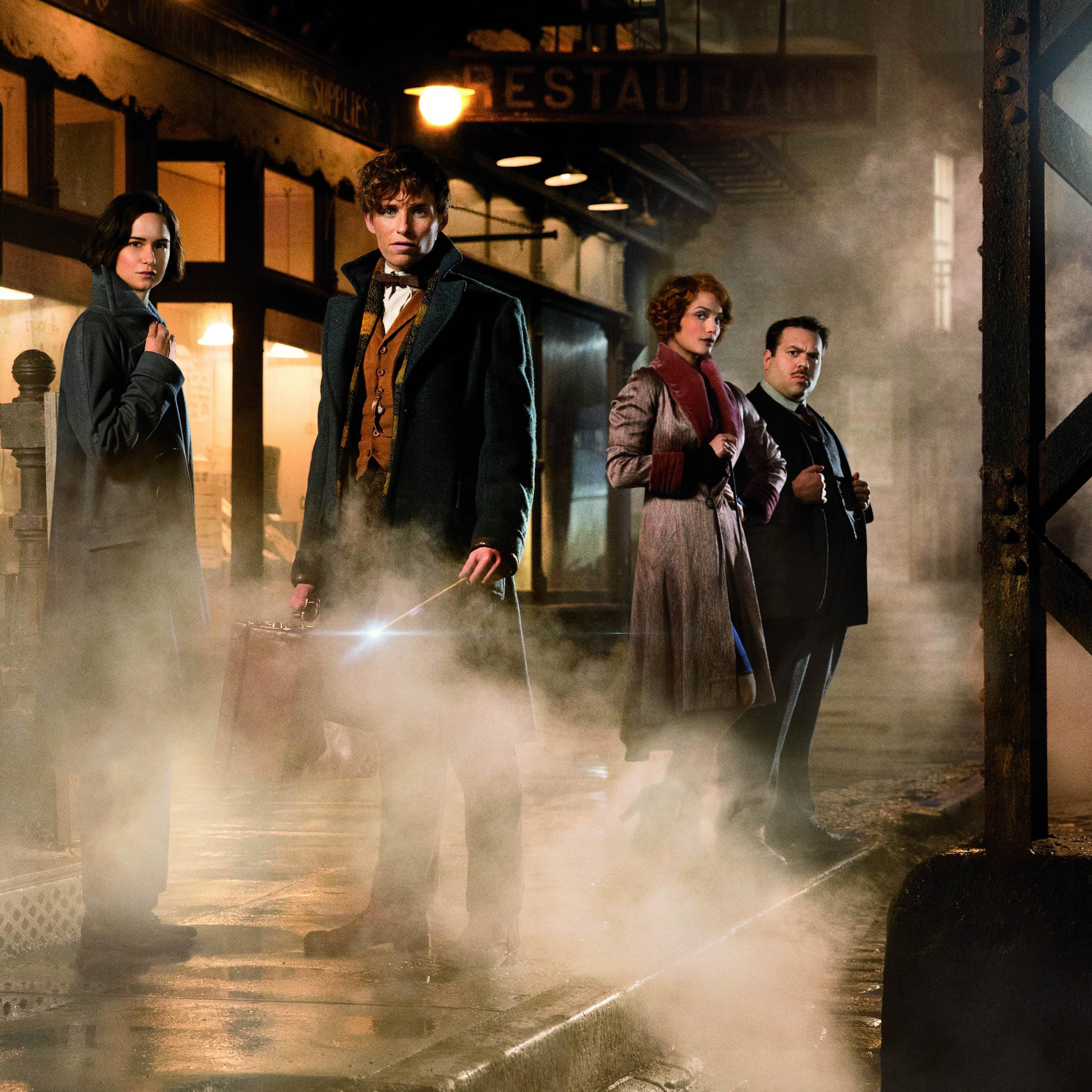 Katherine Waterston as Tina, Eddie Redmayne as Newt Scamander, AIison Sudol as Queenie and Dan Fogler as Jacob in Warner Bros. Pictures' fantasy adventure "Fantastic Beasts and Where to Find Them."