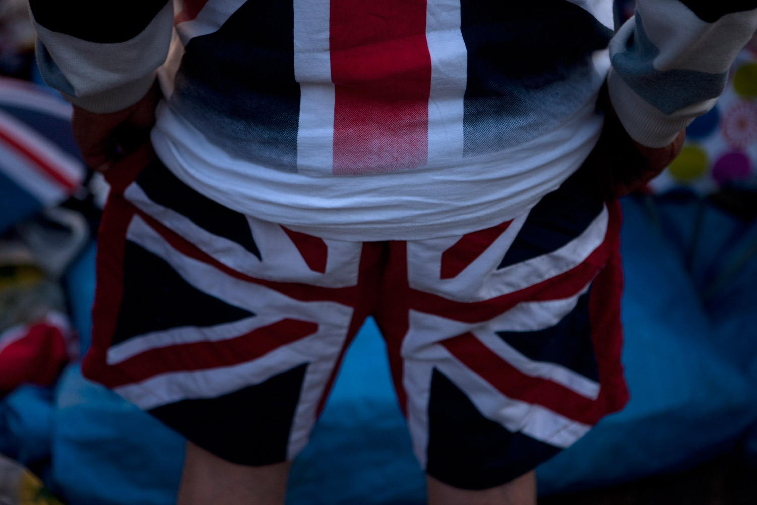 Decked in Union Jack gear, a man camps overnight near Westminster Abbey, April 27, 2011.