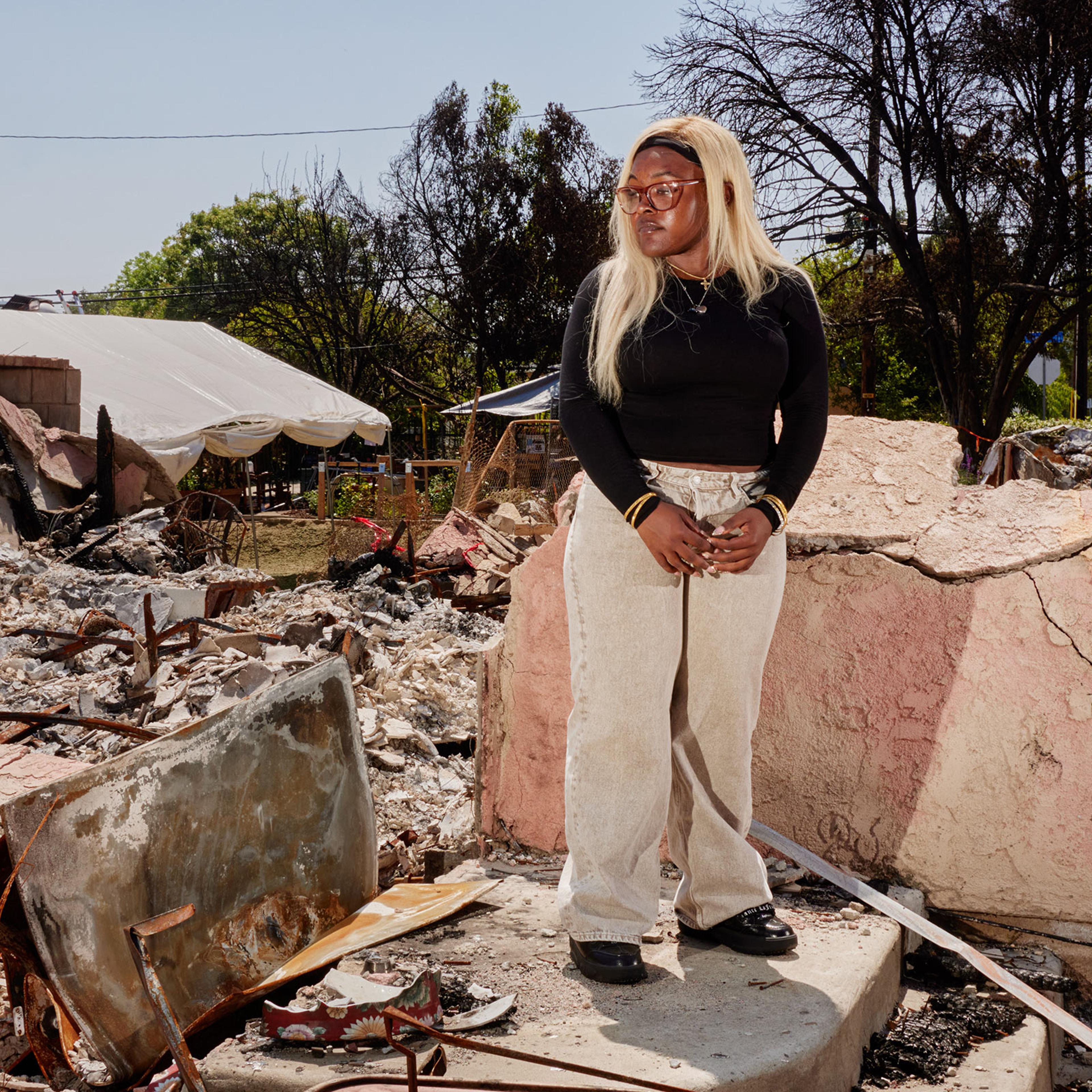 Heavyn Harmon, a John Muir High School senior at the ruins of her family home destroyed during the Eaton Fire in Altadena, CA, May 27, 2025.