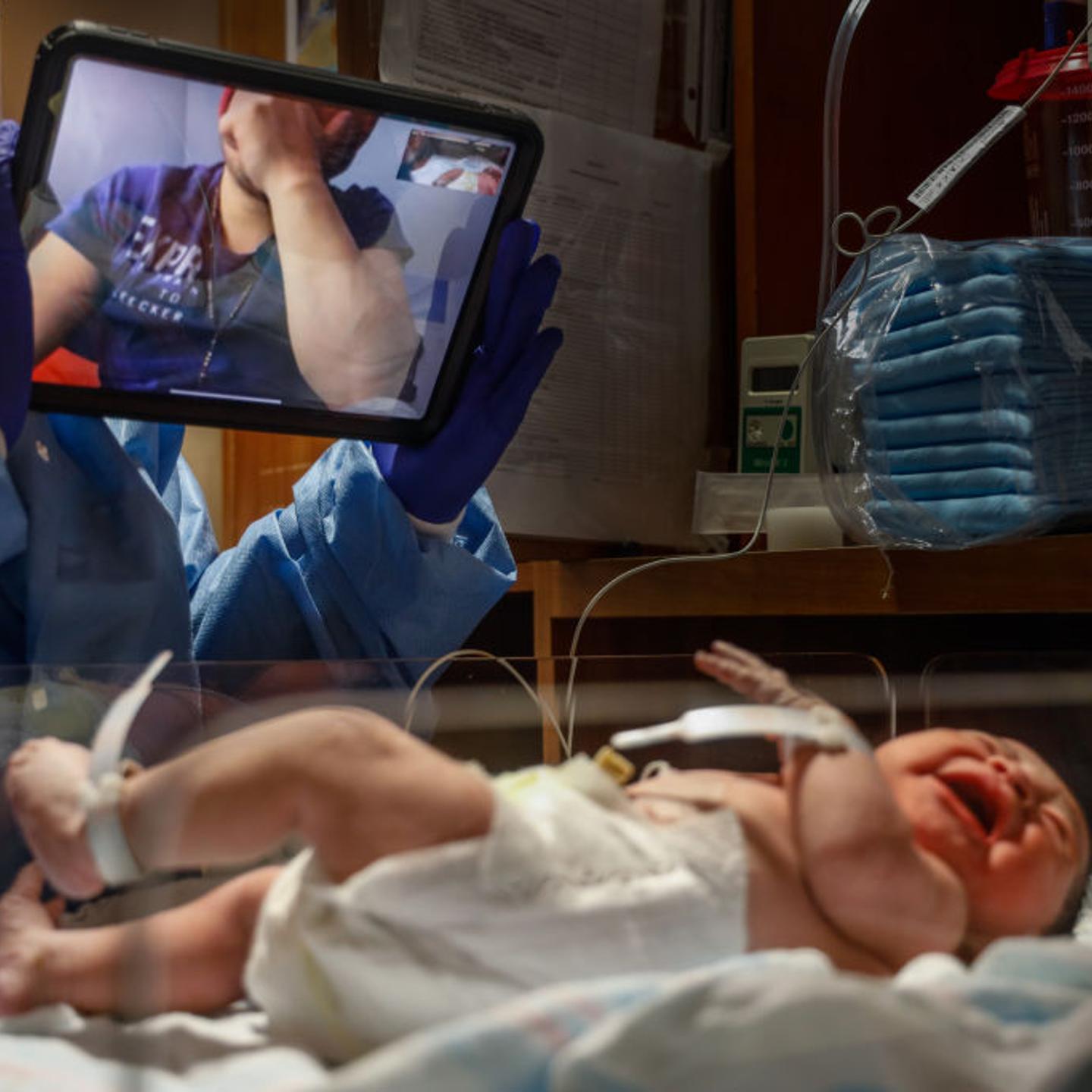 Father cries as he sees his newborn daughter via FaceTime during pandemic