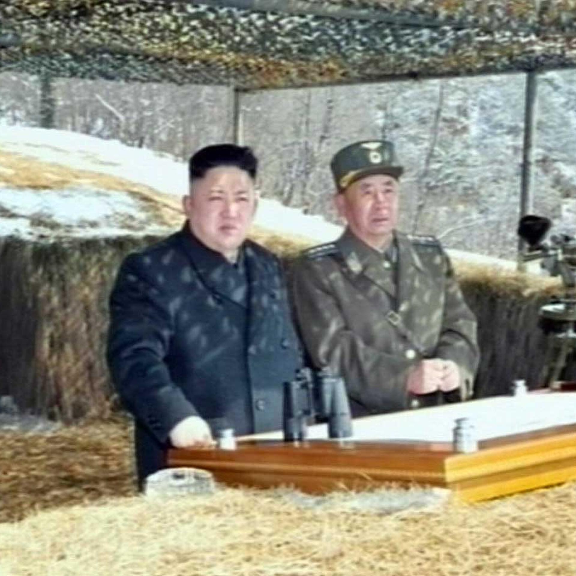 This video grab taken from North Korean TV on March 20, 2013 shows North Korean leader Kim Jong-Un's overseeing a live fire military drill.
