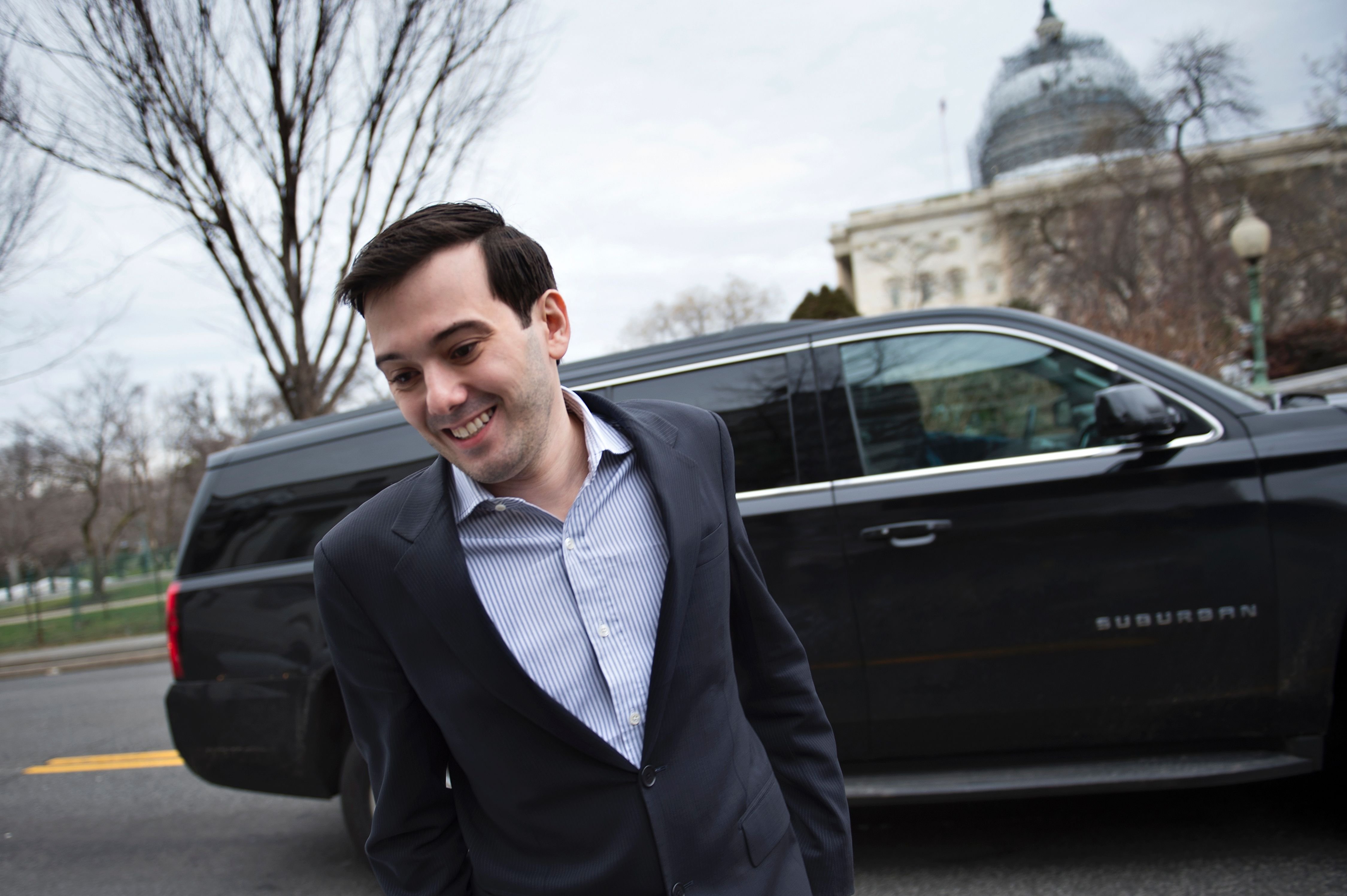 Entrepreneur and pharmaceutical executive Martin Shkreli waits for a car to pick him up after invoking his Fifth Amendment rights during a hearing of the House Oversight and Government Reform Committee on Capitol Hill Feb. 4, 2016 in Washington.