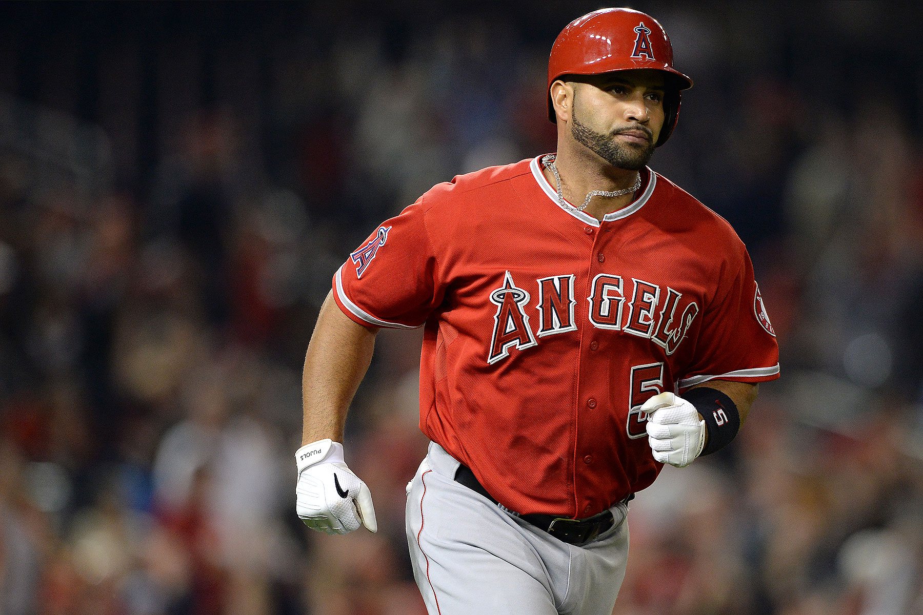 Albert Pujols #5 of the Los Angeles Angels of Anaheim rounds the bases after hitting a two-run home run against the Washington Nationals in the fifth inning at Nationals Park on April 22, 2014 in Washington, DC