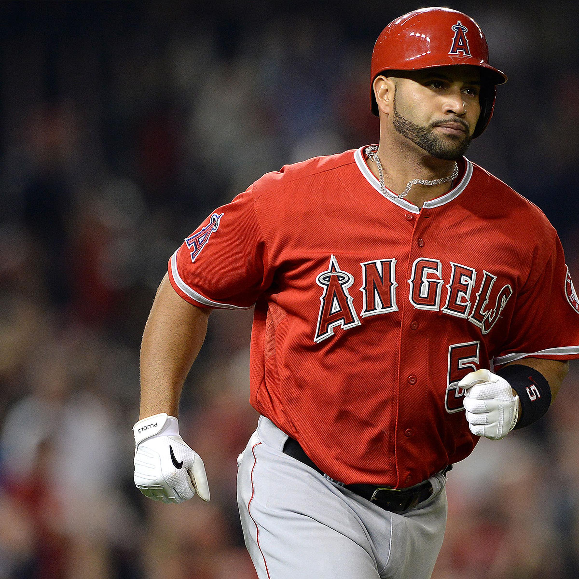Albert Pujols #5 of the Los Angeles Angels of Anaheim rounds the bases after hitting a two-run home run against the Washington Nationals in the fifth inning at Nationals Park on April 22, 2014 in Washington, DC