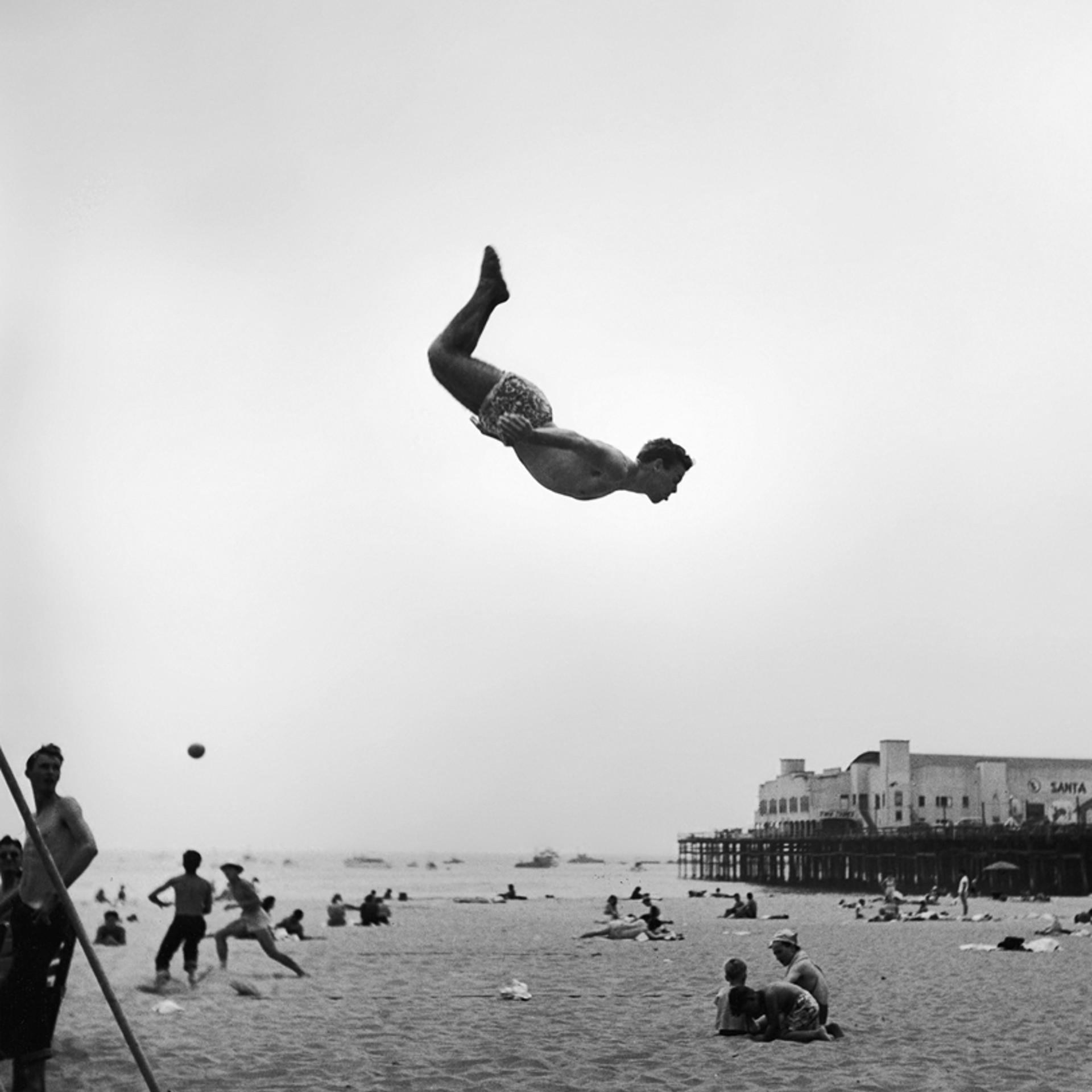 A man flies off a trampoline, Santa Monica, 1948.
