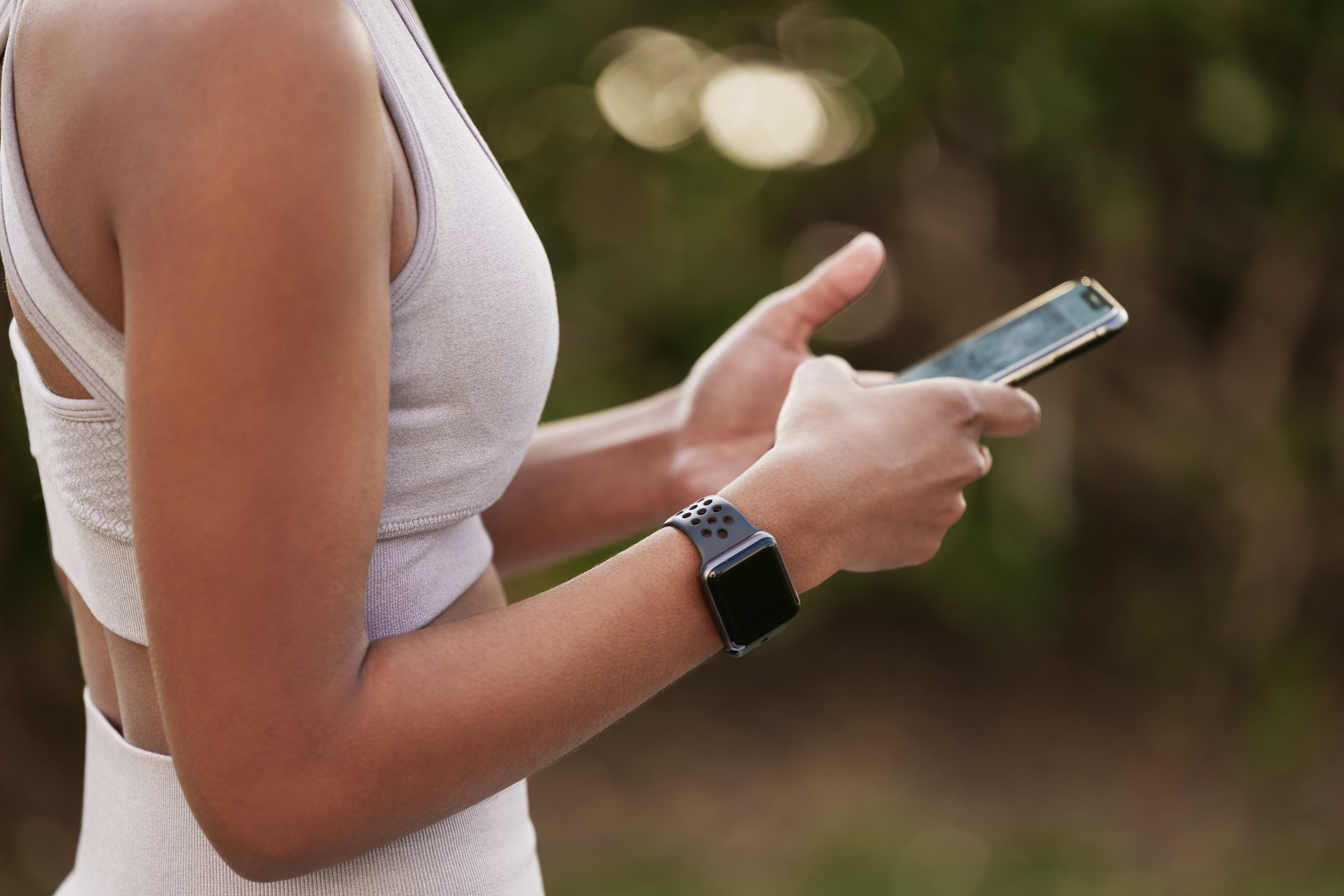 woman exercising with phone