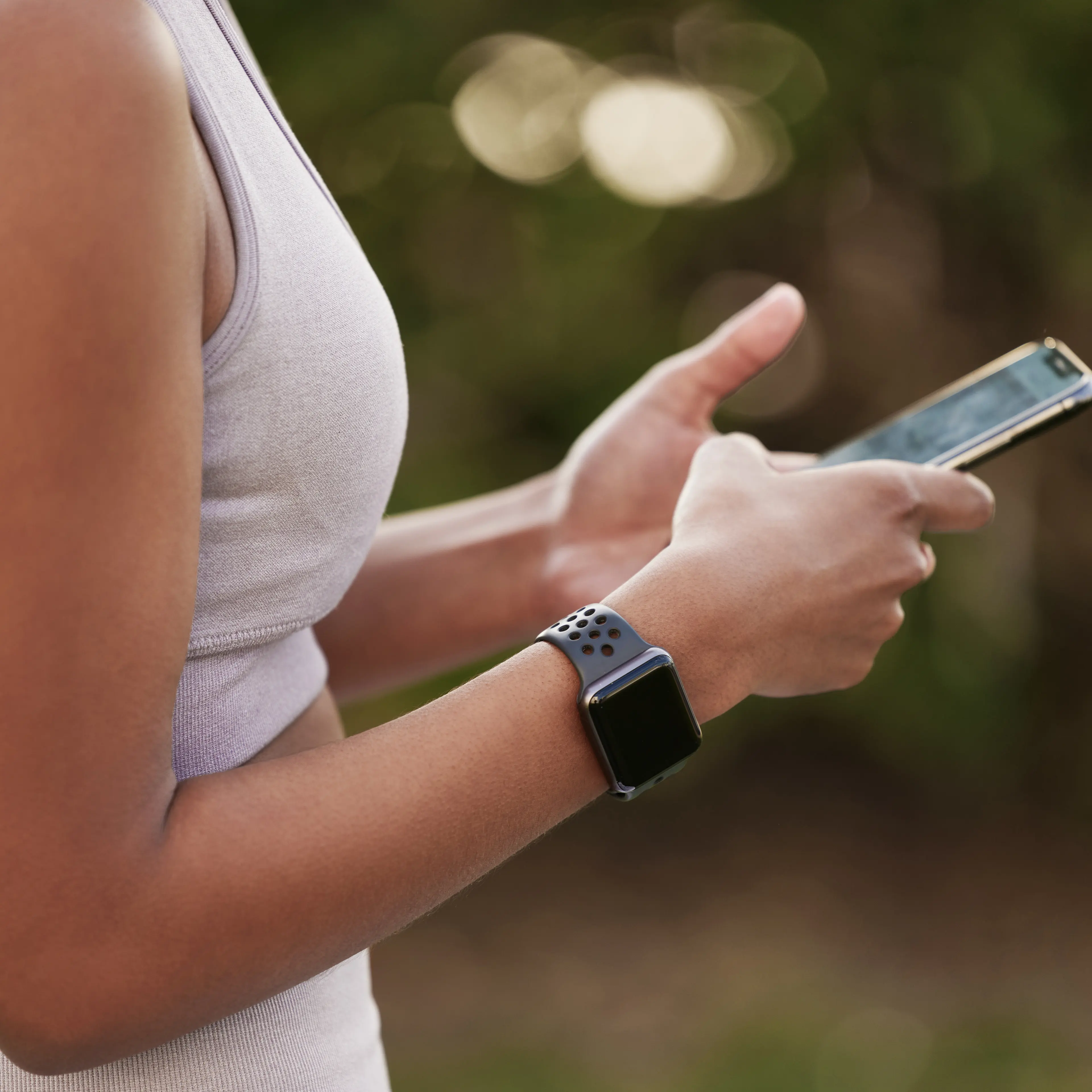 woman exercising with phone