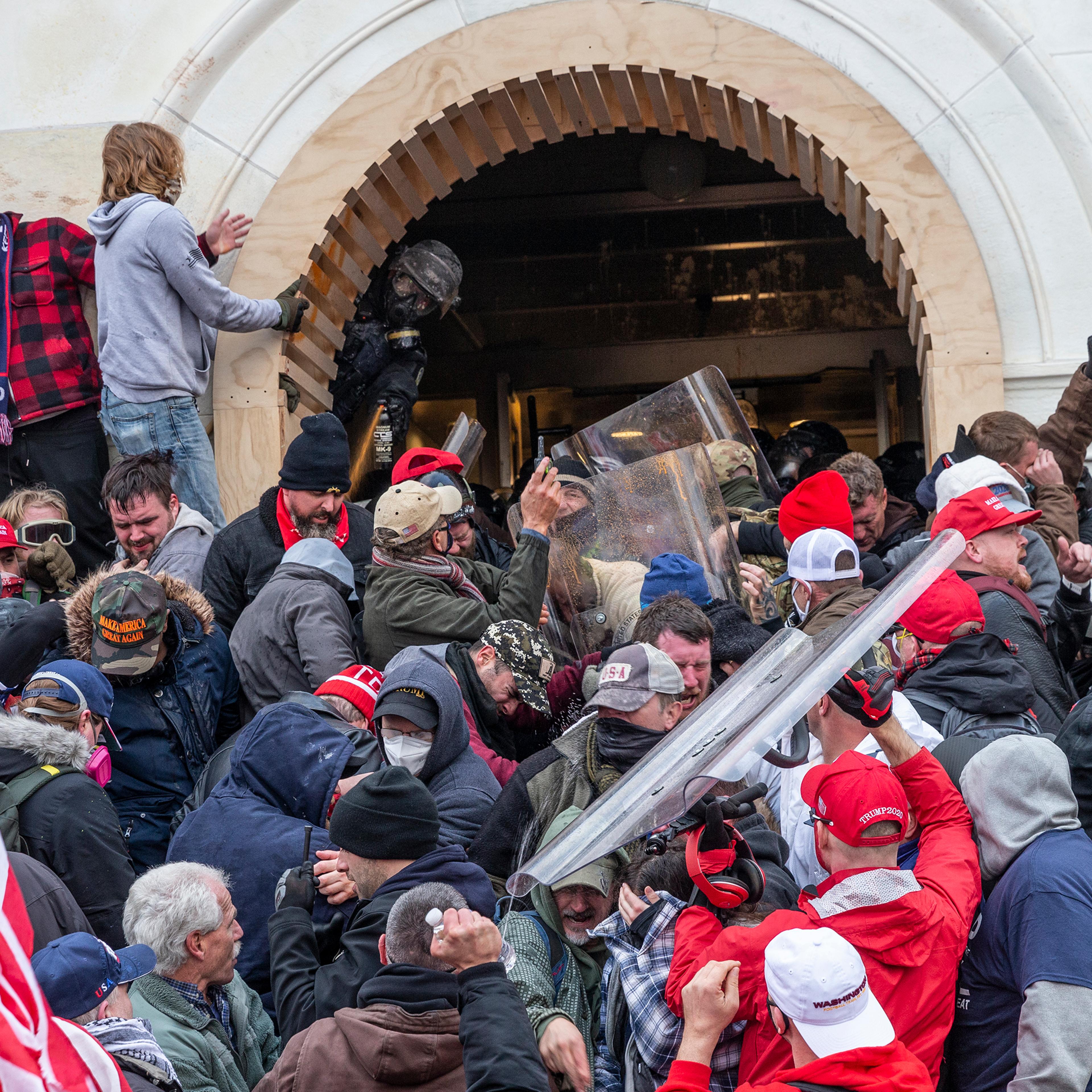Rioters clash with police trying to enter Capitol building