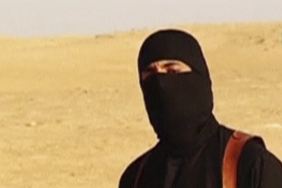 The ISIS militant who has been identified as a Briton named Mohammed Emwazi, seen in a propaganda video.