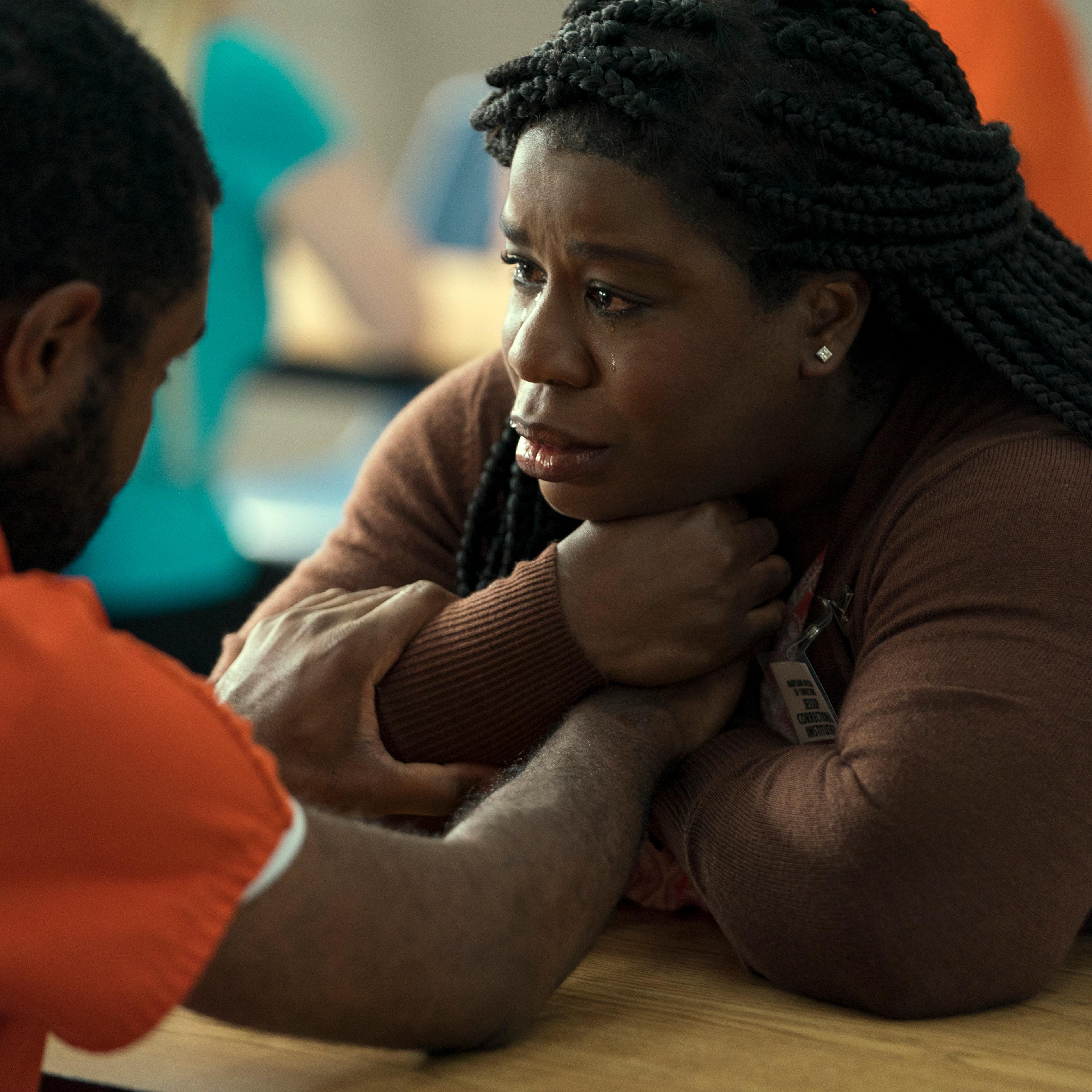 Painkiller. (L to R) Jamaal Grant as Shawn Flowers, Uzo Aduba as Edie in episode 106 of Painkiller. Cr. Keri Anderson/Netflix © 2023