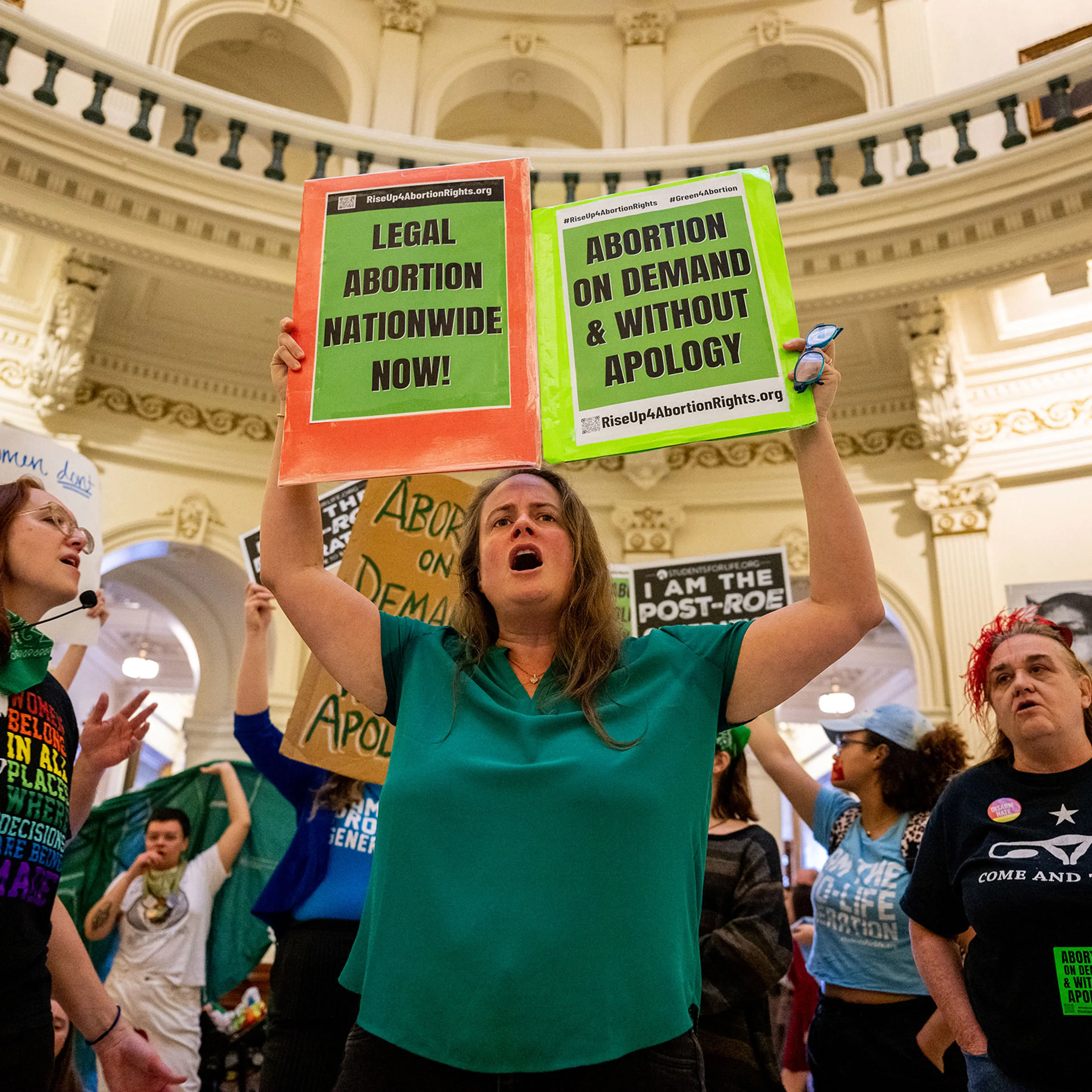 Abortion rights activist Rachel Bailey chants during an International Women's Day abortion rights demonstration at the Texas State Capitol in Austin on March 8, 2023.