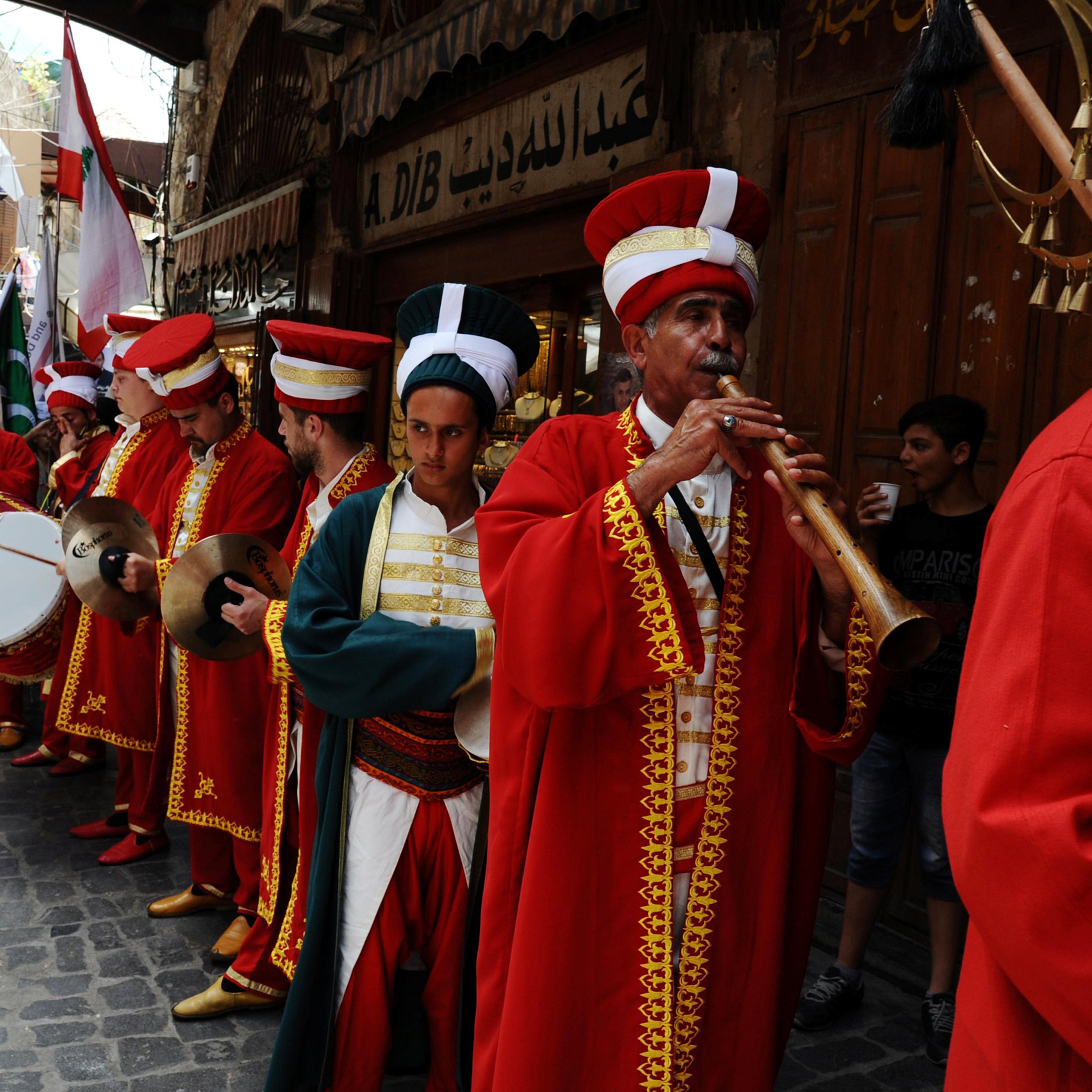 A Turkish band plays music welcoming the holy fasting month of Ramadan in Tripoli, Lebanon, June 3, 2016.