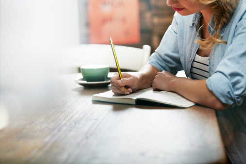 woman-writing-close-up