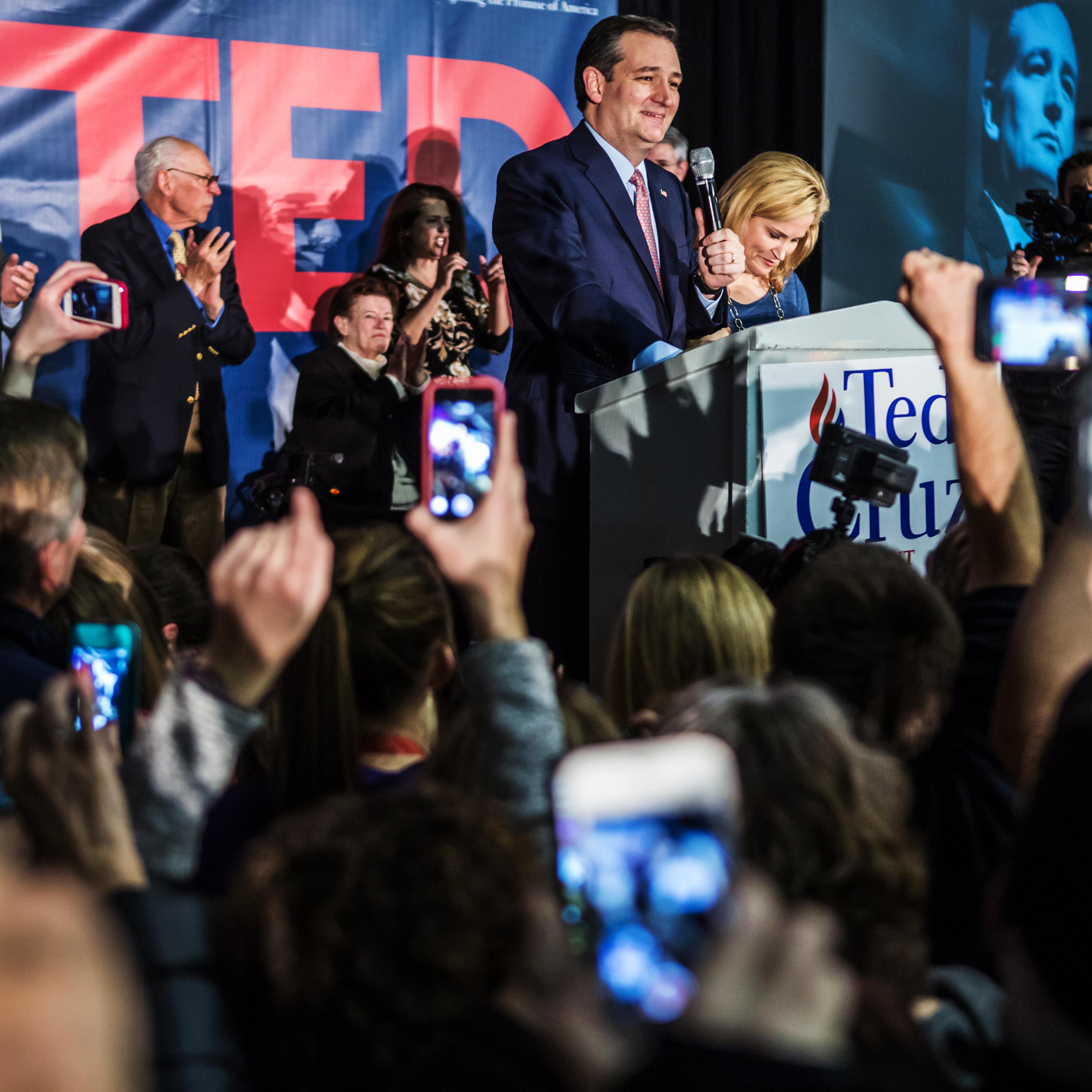 Republican presidential candidate Sen. Ted Cruz, r-TX, joined by his wife Heidi Cruz, speaks at a caucus night rally in Des Moines, Iowa, on Feb. 1, 2016.