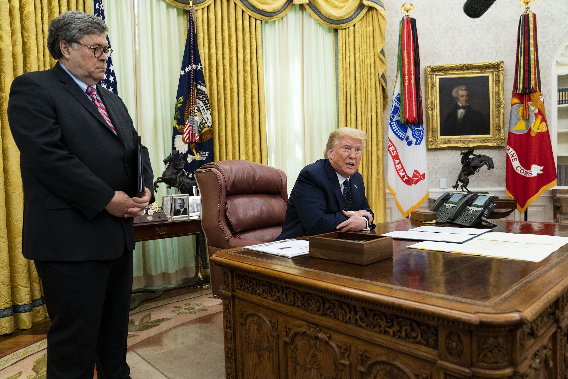 President Donald Trump, right, speaks while Attorney General William Barr stands during an executive order signing event in Washington, D.C. on May 28, 2020.