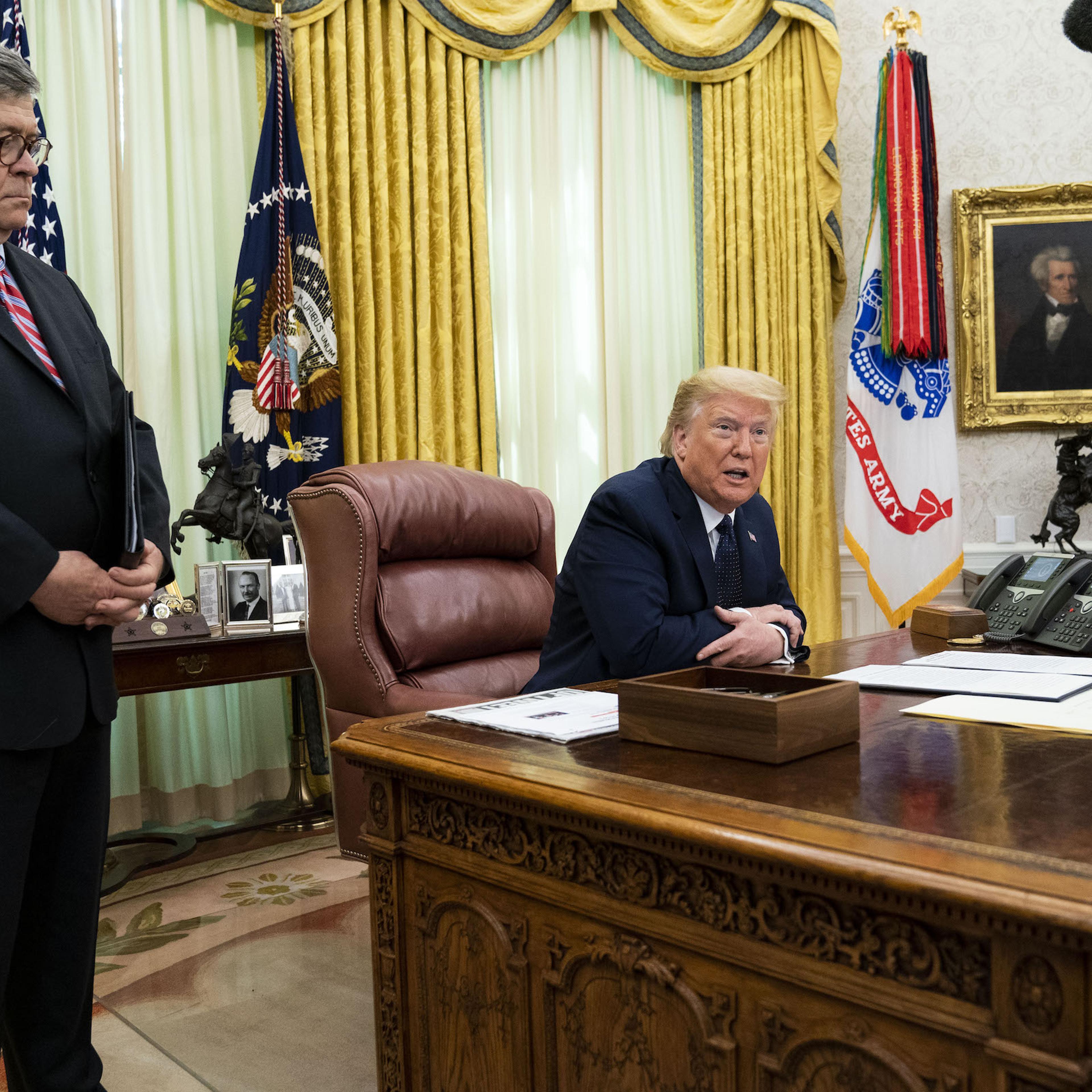 President Donald Trump, right, speaks while Attorney General William Barr stands during an executive order signing event in Washington, D.C. on May 28, 2020.