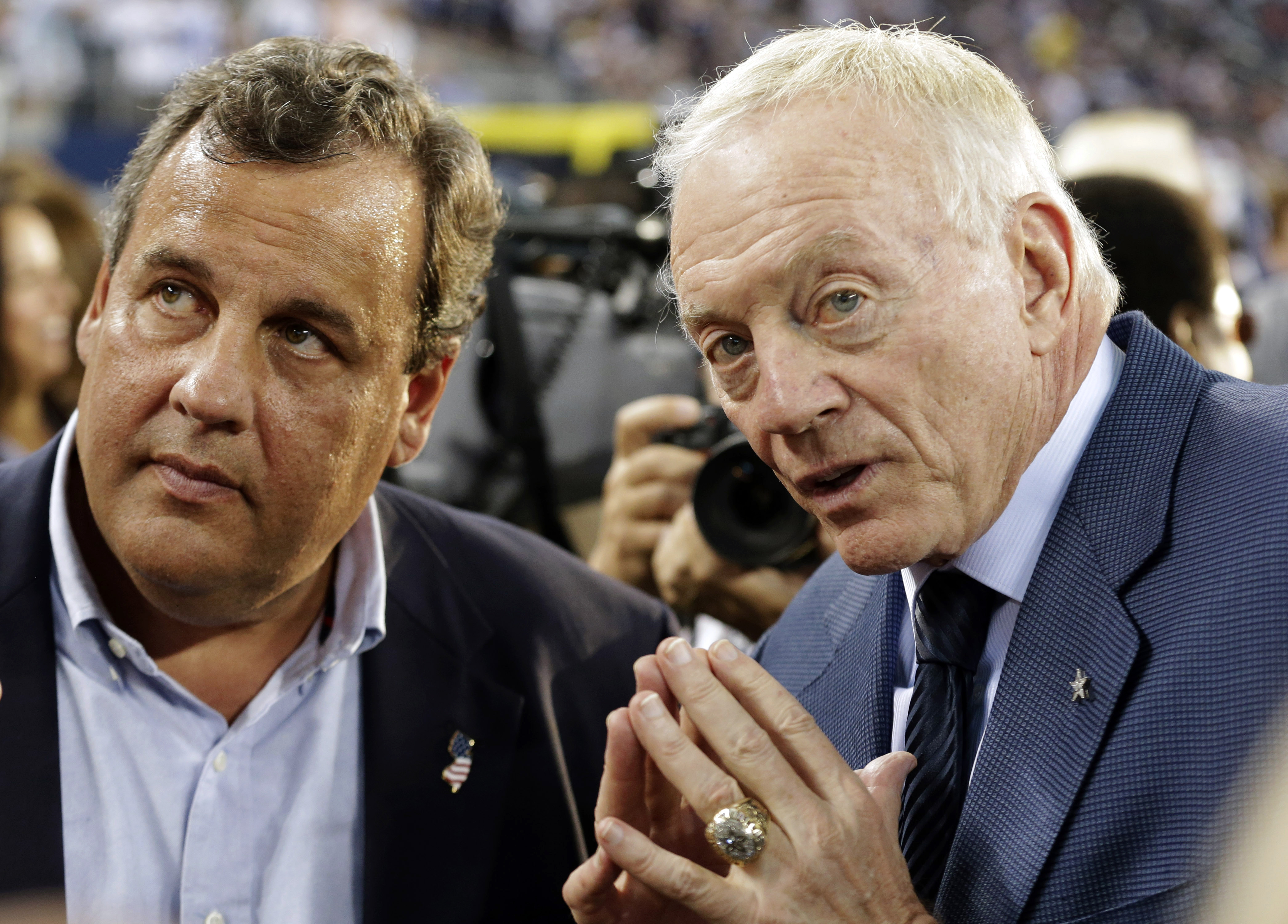 New Jersey Gov. Chris Christie, left, and Dallas Cowboys owner Jerry Jones talk before an NFL football game between the New York Giants and the Cowboys on Sept. 8, 2013, in Arlington, Texas.
