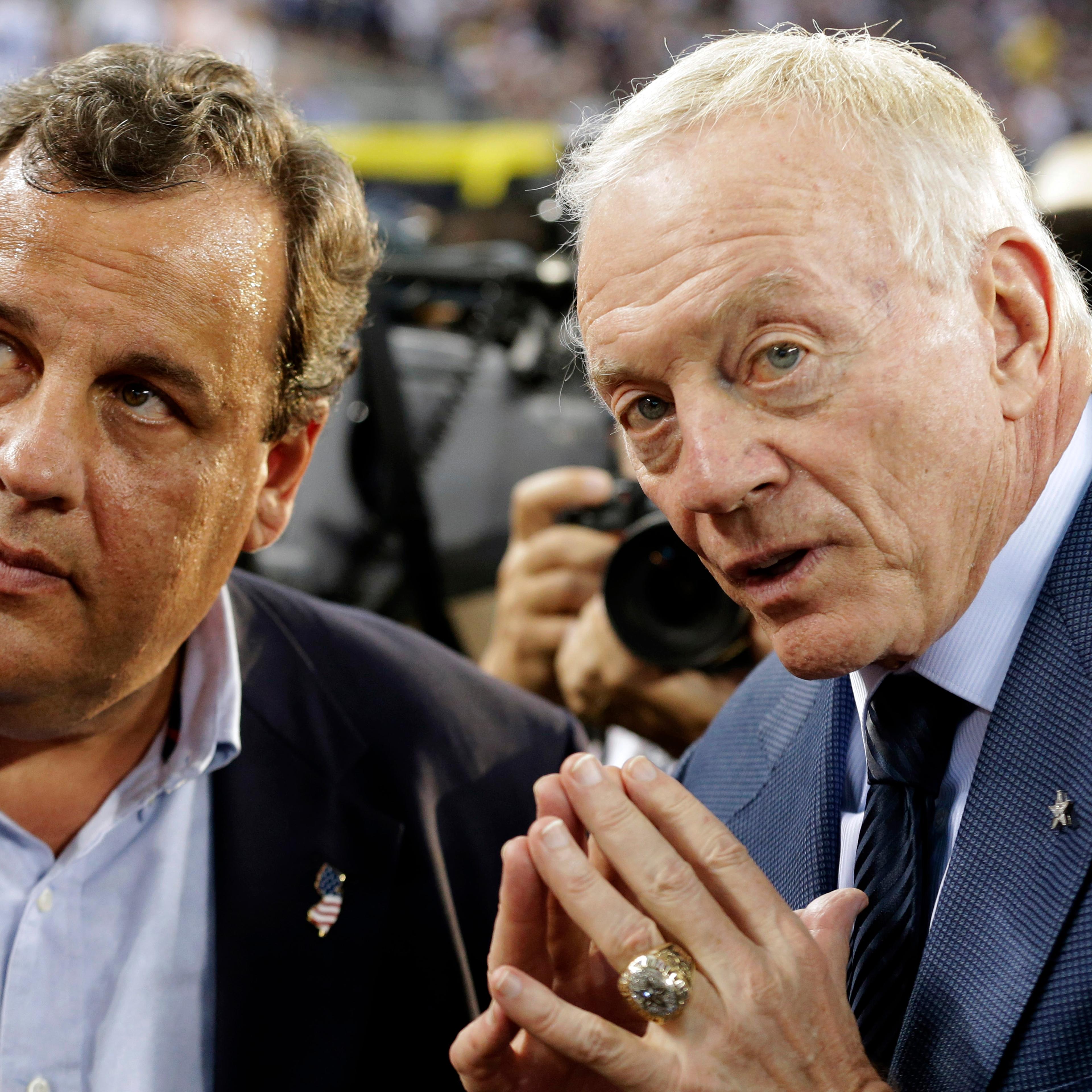 New Jersey Gov. Chris Christie, left, and Dallas Cowboys owner Jerry Jones talk before an NFL football game between the New York Giants and the Cowboys on Sept. 8, 2013, in Arlington, Texas.