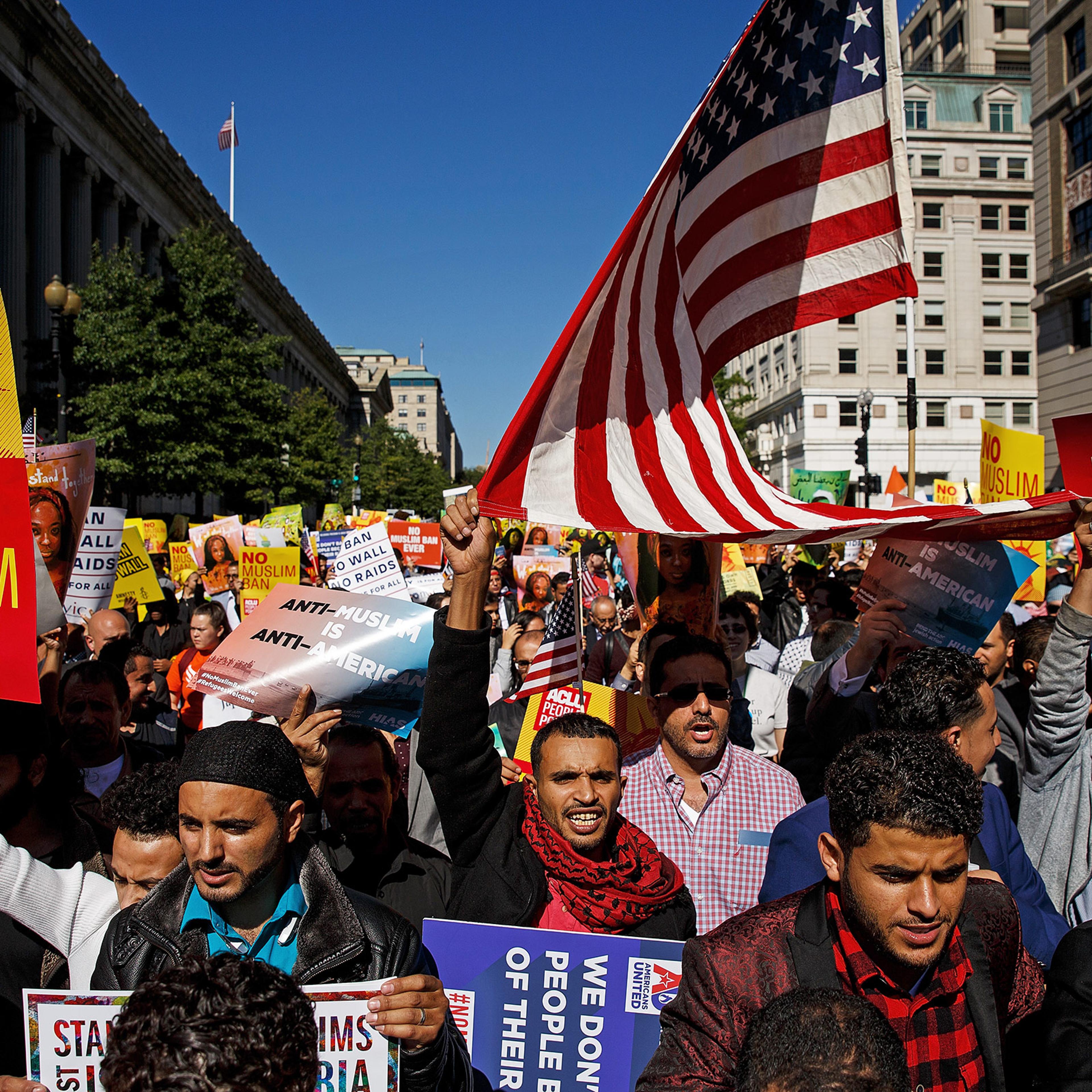 Protesters in Washington, D.C., march against Trump’s attempts to restrict travel from predominantly Muslim countries in October 2017