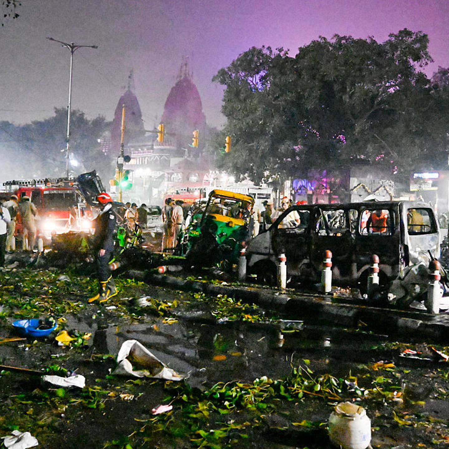 Fire Brigade personnel try to douse a fire after a blast near the Red Fort Metro Station Gate No. 1 in New Delhi, India, on Nov. 10, 2025.