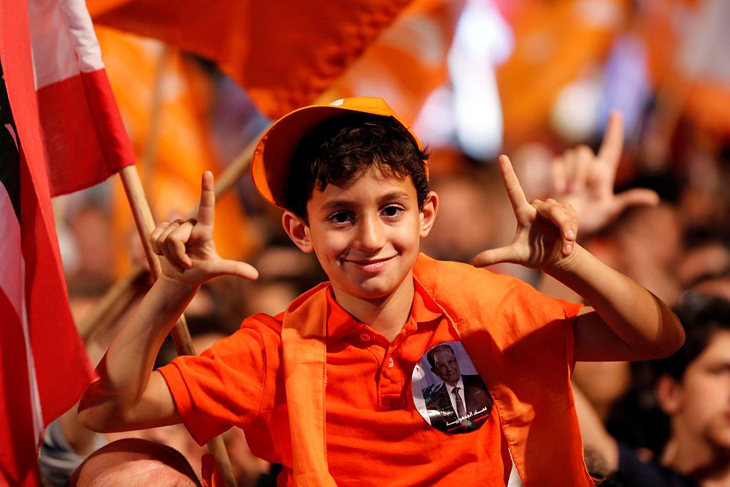 BEIRUT, LEBANON - OCTOBER 31: People take part in a celebration after Michel Aoun elected as a President during the Parliamentary session, in Beirut, Lebanon on October 31, 2016. (Photo by Ratib Al Safadi/Anadolu Agency/Getty Images)