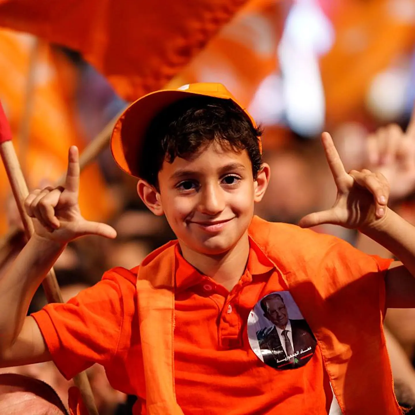 BEIRUT, LEBANON - OCTOBER 31: People take part in a celebration after Michel Aoun elected as a President during the Parliamentary session, in Beirut, Lebanon on October 31, 2016. (Photo by Ratib Al Safadi/Anadolu Agency/Getty Images)
