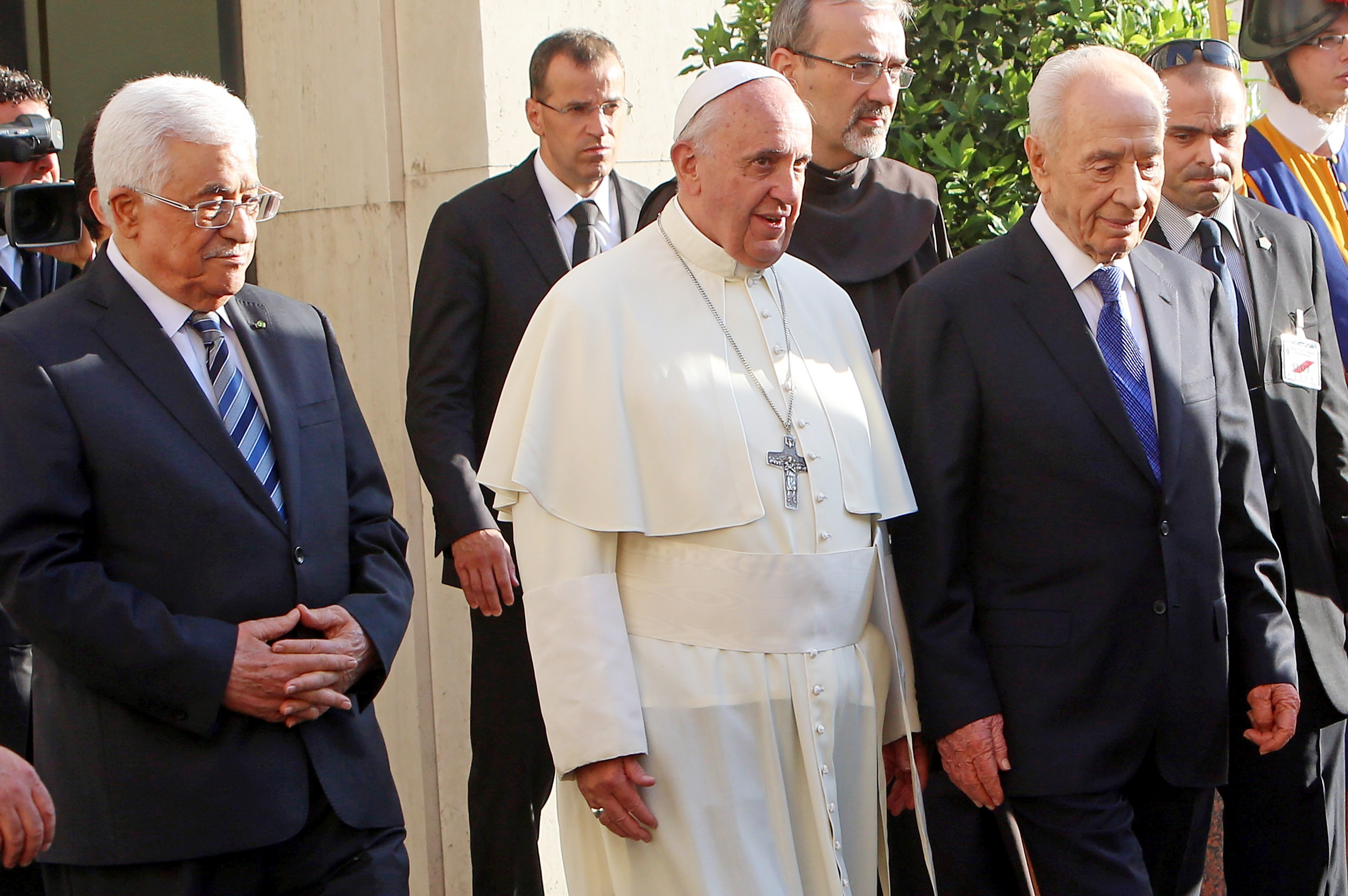 From left: Palestinian President Mahmoud Abbas, Pope Francis and Israeli President Shimon Peres reach the Vatican Garden for a meeting of prayer for peace.